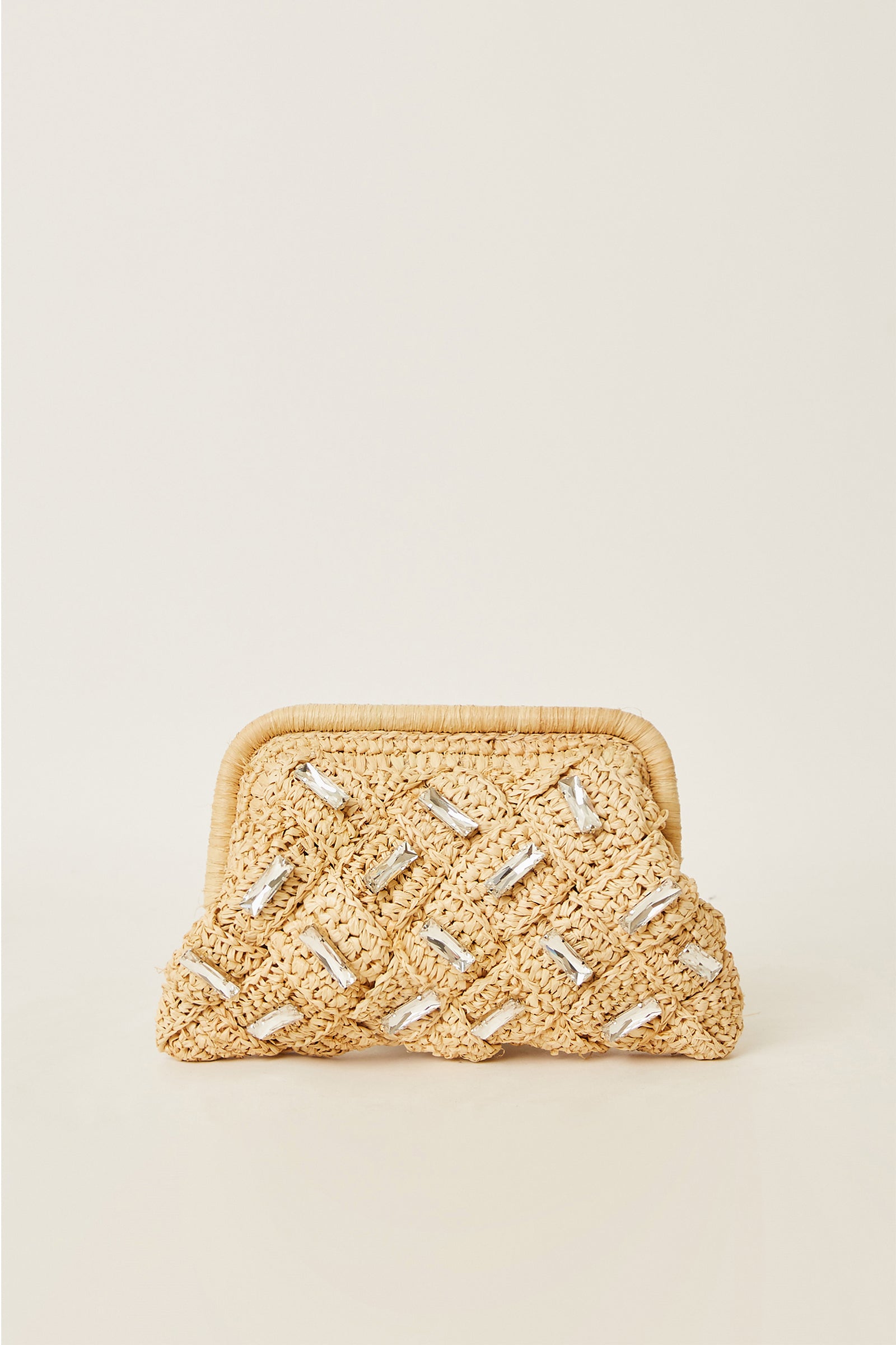 The BTB Gigi Crystal Clutch in natural features a woven design with a rectangular frame and shiny silver accents in a crisscross pattern, making it an elegant evening bag against a light background.