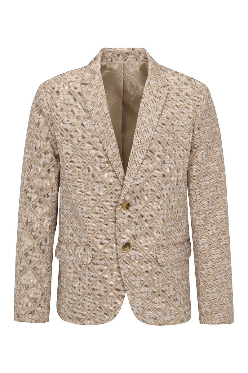 The Thurston Blazer - Metallic Daisy Jacquard features a beige geometric and floral jacquard pattern, notched lapels, two front buttons, flap pockets, and a light tan lining.