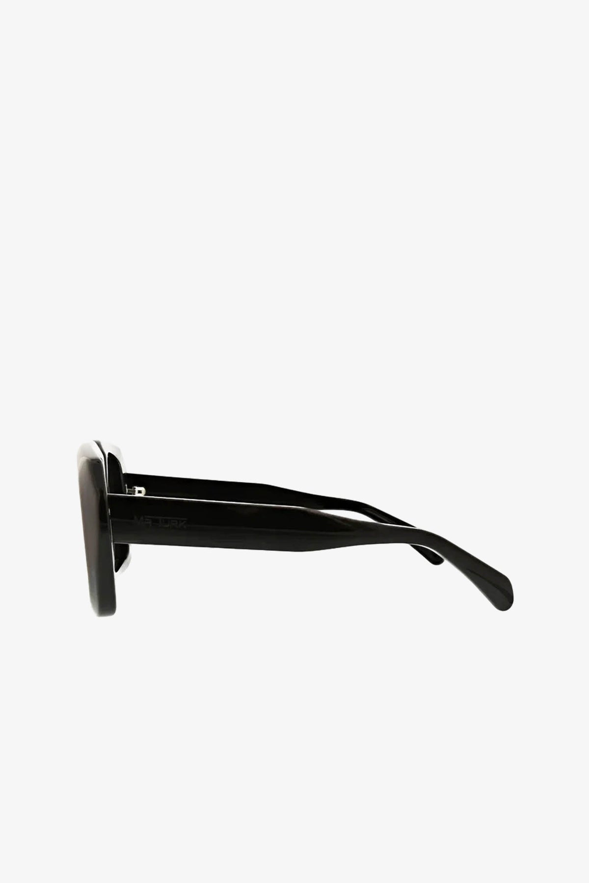 Side view of the Andros Sunglass in black, featuring thick, curved arms and dark lenses, set against a plain white background.