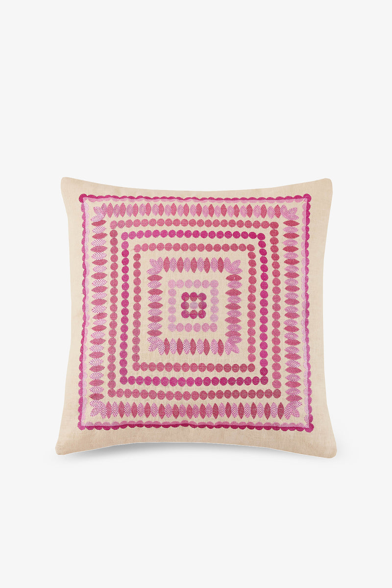 Carmel Embroidered Square Pillow with a beige background, showcasing pink and purple geometric dots and ovals in concentric square patterns.