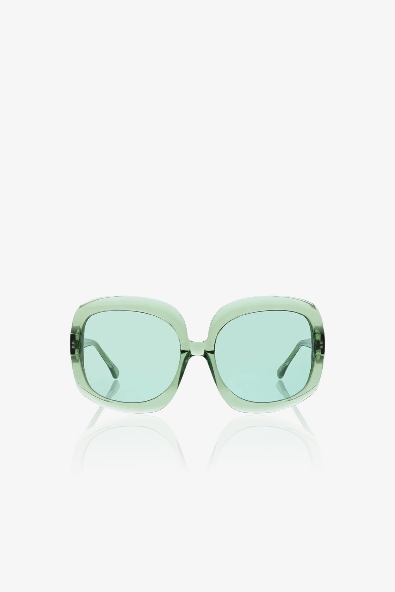 Bedarra Sunglasses featuring oversized square frames in light green with matching tinted lenses, displayed against a plain white background.