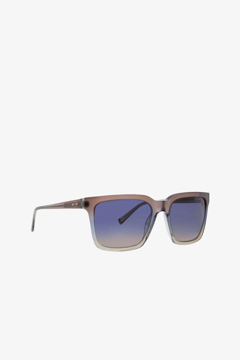 Moneo Sunglass featuring rectangular brown translucent frames and blue gradient lenses, displayed on a white background.