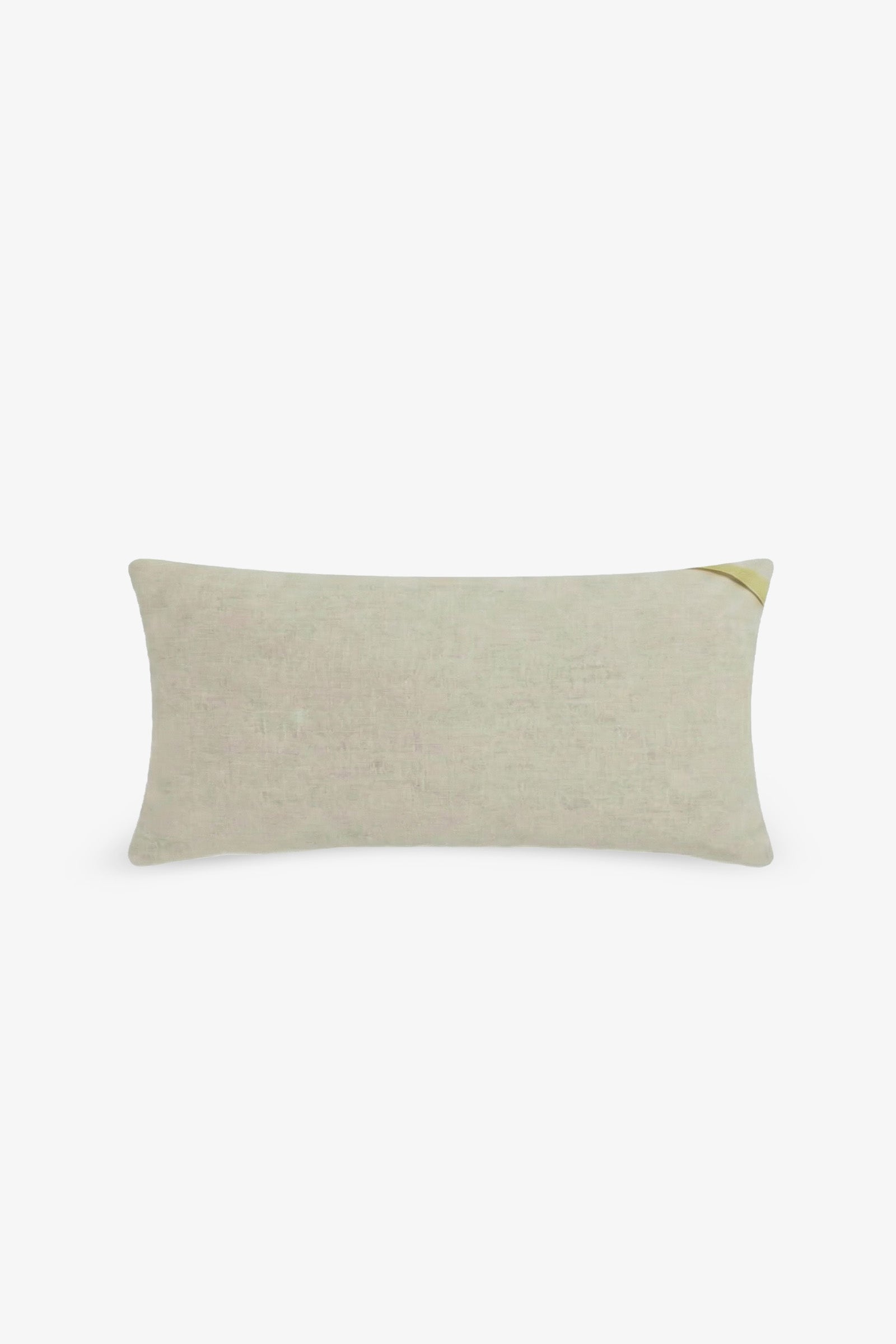 Santorini Embroidered Lumbar Pillow featuring a rectangular beige cotton percale design with a simple, plain fabric texture and a subtle light yellow folded corner detail at the top right, displayed on a white background.