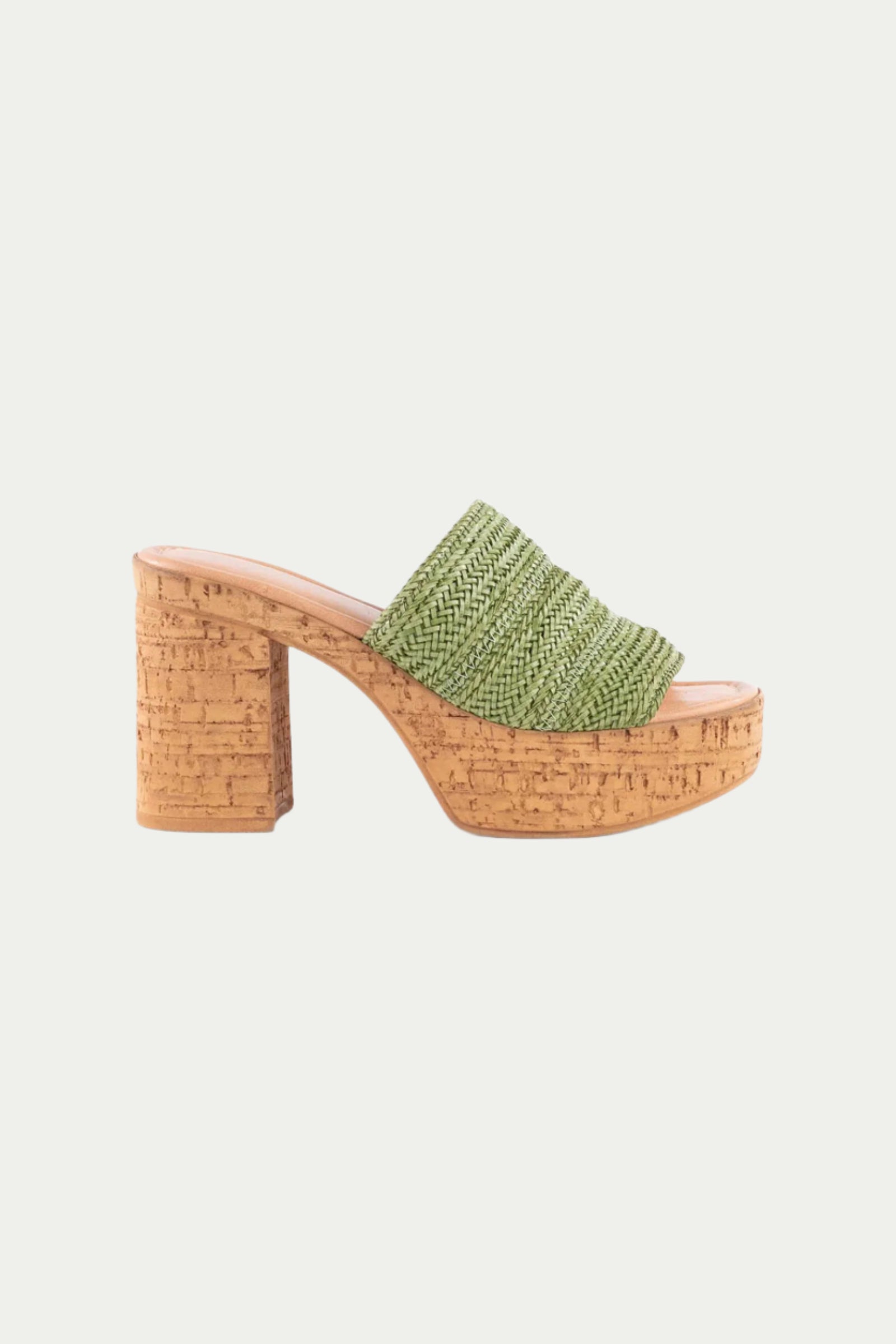 The Seychelles Applause Platform is a single open-toe mule sandal in green, crafted with woven raffia, a wide top strap, and finished with a chunky cork platform and block heel.
