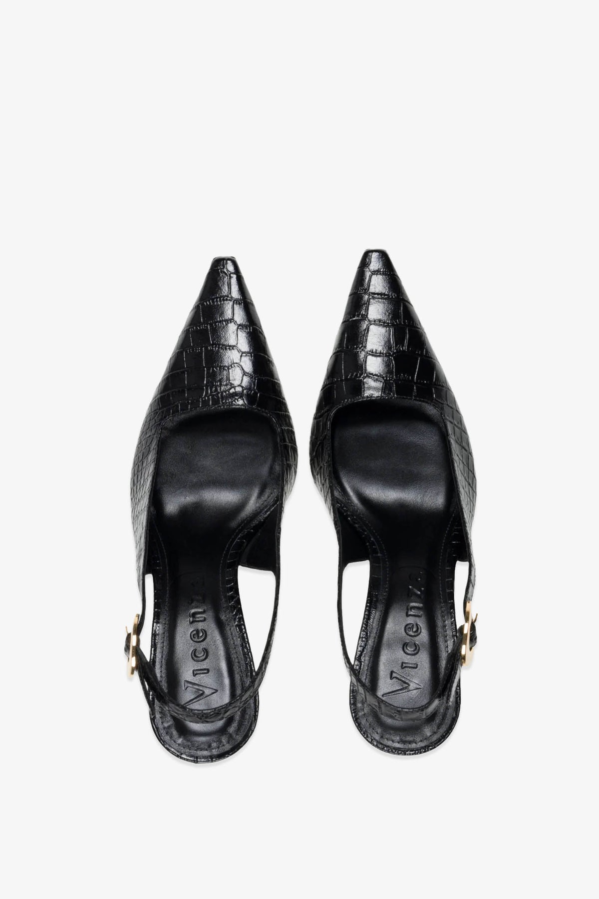 The Naomi Slingback Heel is a pair of black, pointed-toe slingback shoes featuring a crocodile texture and low heels, displayed from above on a white background.