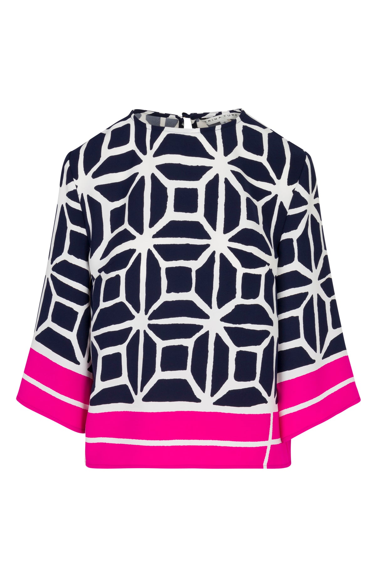 The Muria 3/4-Sleeve Top in Durell Georgette features a navy blue base with a white geometric pattern and striking hot pink bands at the cuffs and hem.