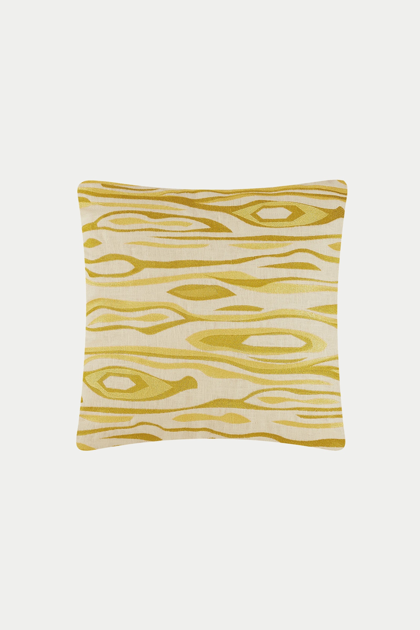 The Monterey Emb Pillow 20"x20" features a cream background with a yellow, woodgrain-inspired pattern of organic, elongated shapes resembling wood knots and lines on a soft cover.