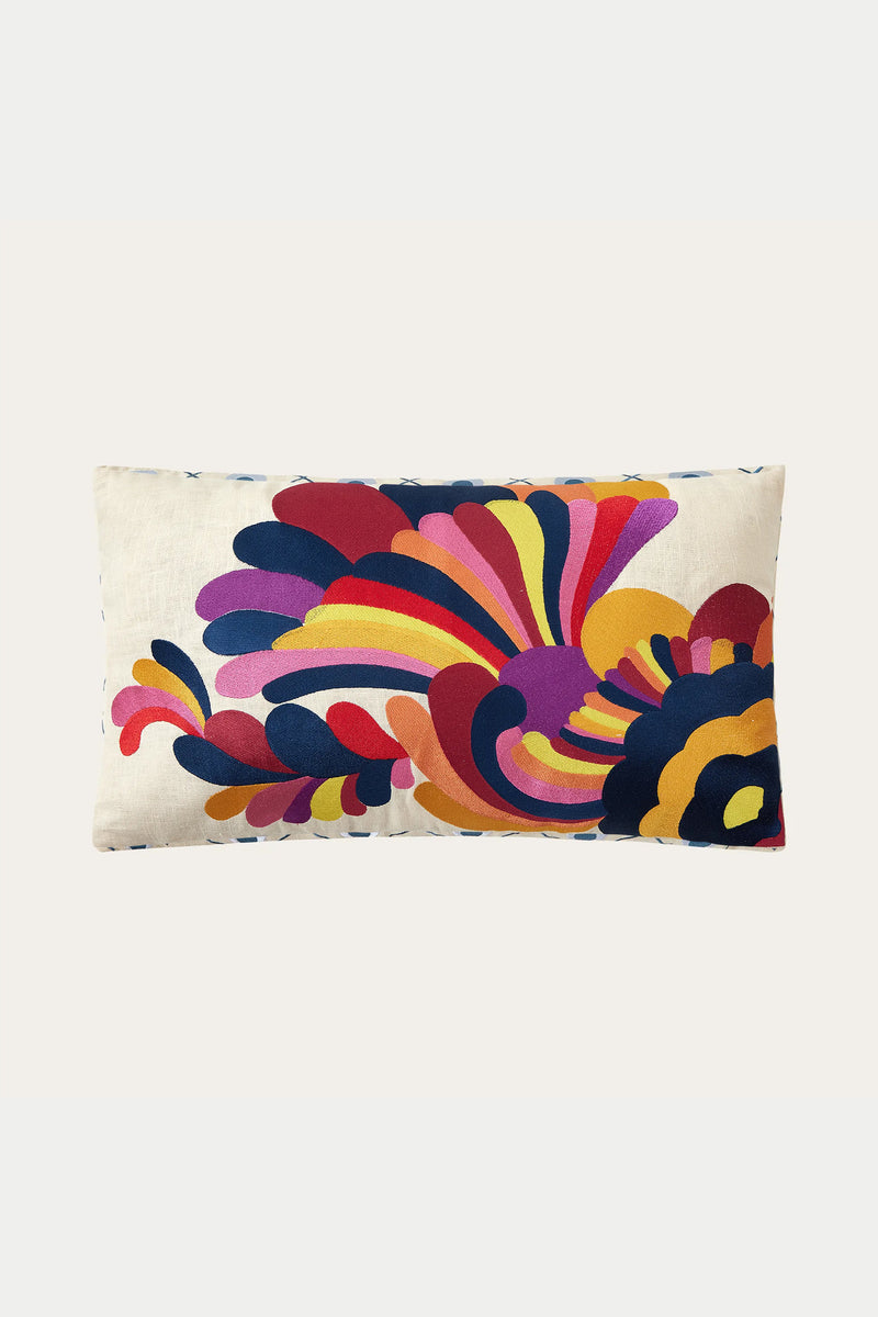 The Escondido Embroidered Throw Pillow - Multi features a cream background with bold, colorful swirling abstract shapes in red, pink, yellow, orange, navy blue, and purple.