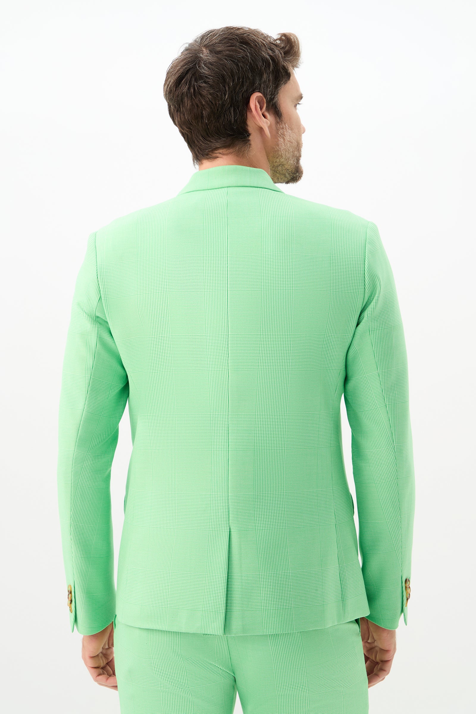 A man wearing the Thurston Blazer - Game Time Glen Plaid has his back to the camera against a plain white background.