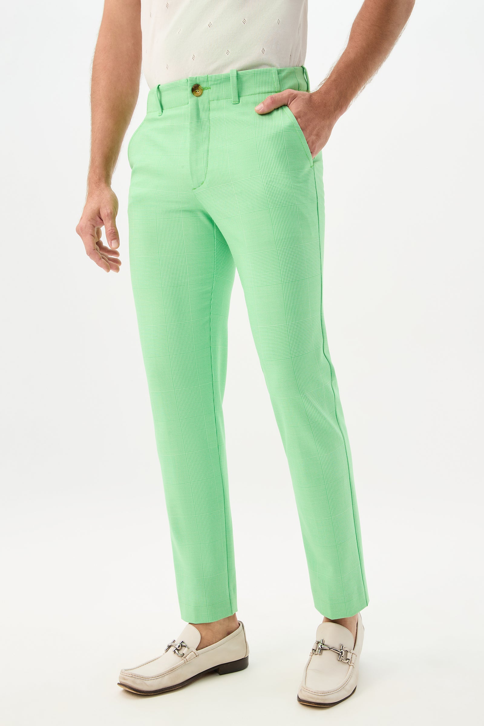 Wearing the Alex Slim Trouser - Game Time Glen Plaid, a person poses with one hand in their pocket against a plain white background.