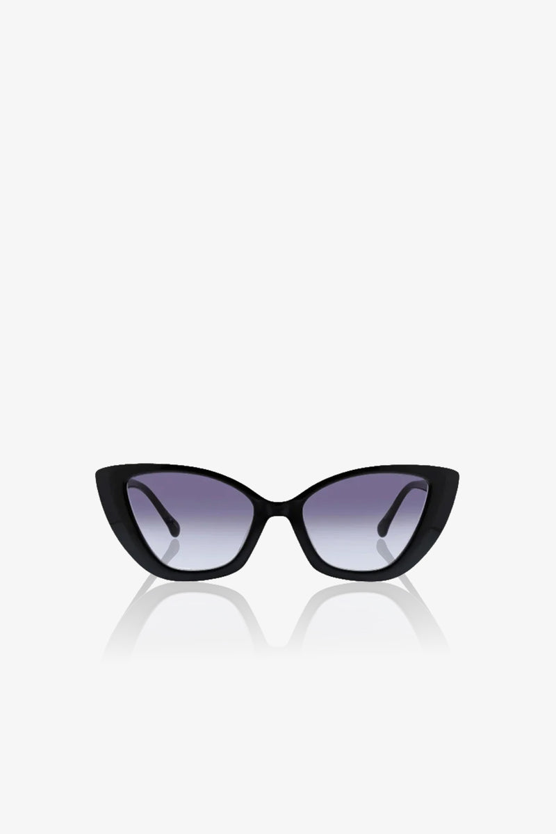 Tenerife Cat Eye Acetate Sunglasses with dark gradient lenses, displayed on a white background. The sleek arms curve inward, and a subtle reflection appears beneath them.