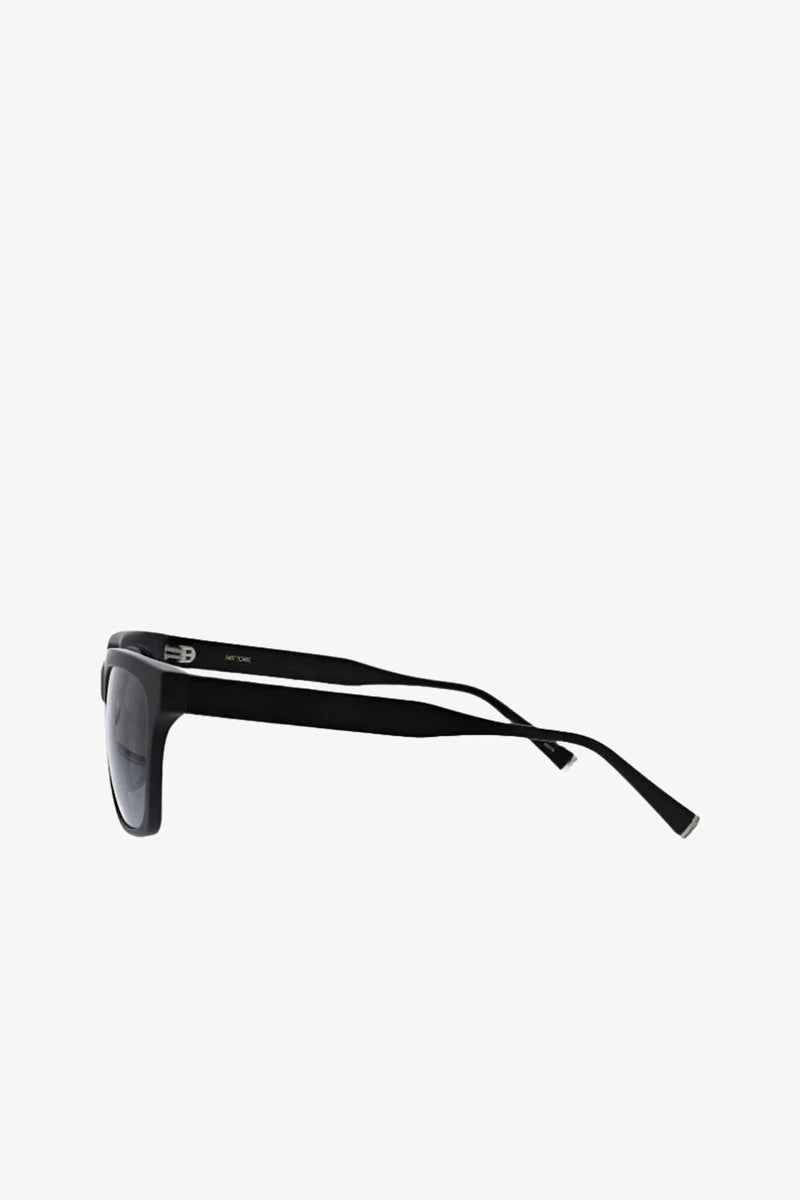 MRT Holl Square Acetate Sunglasses, shown from the side with thick black rectangular frames and dark lenses, set against a plain white background.
