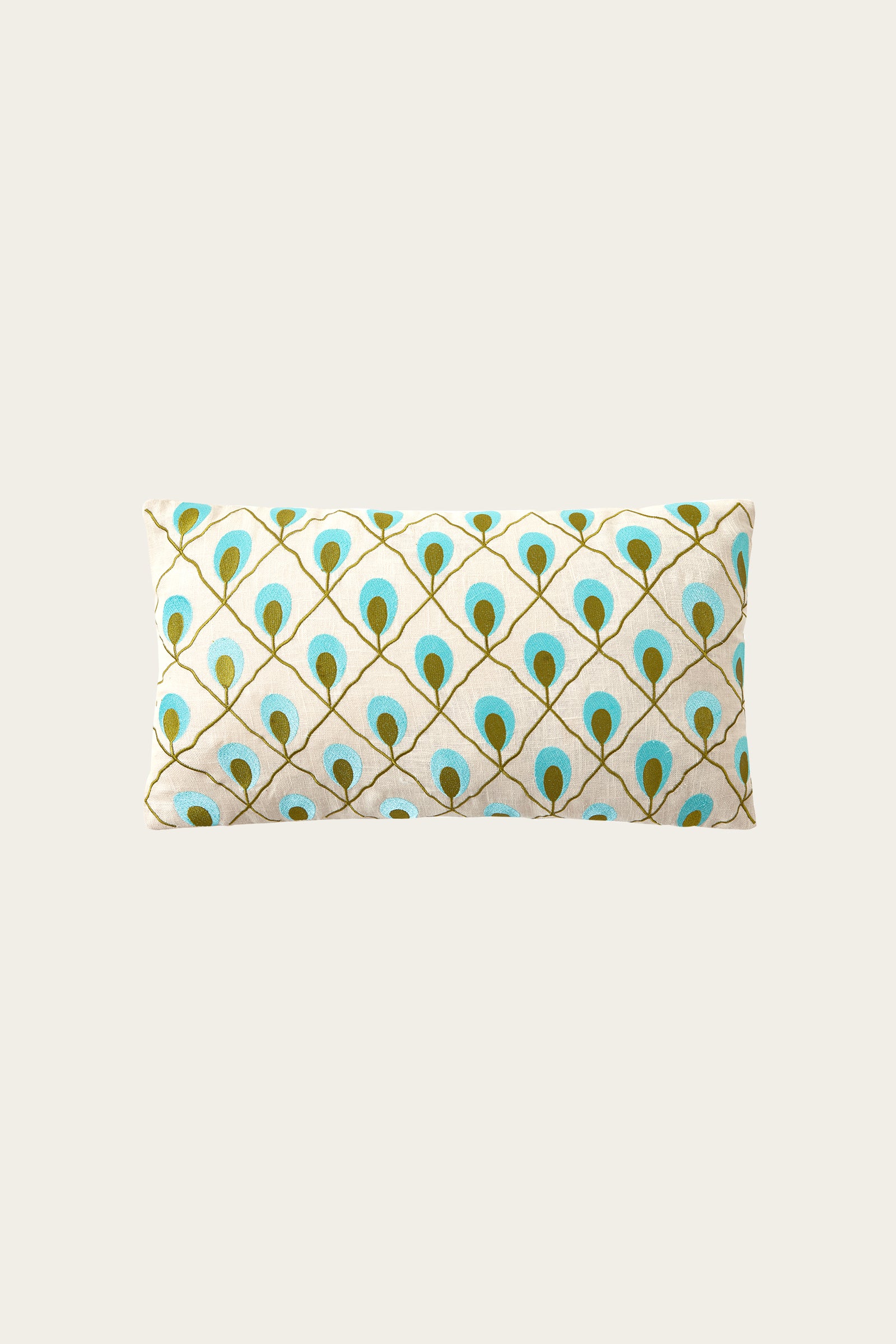 The Roseville Embroidered Throw Pillow - Blue features a rectangular shape with a cream background and a symmetrical diamond-grid pattern of teal, blue, and gold peacock feather motifs.