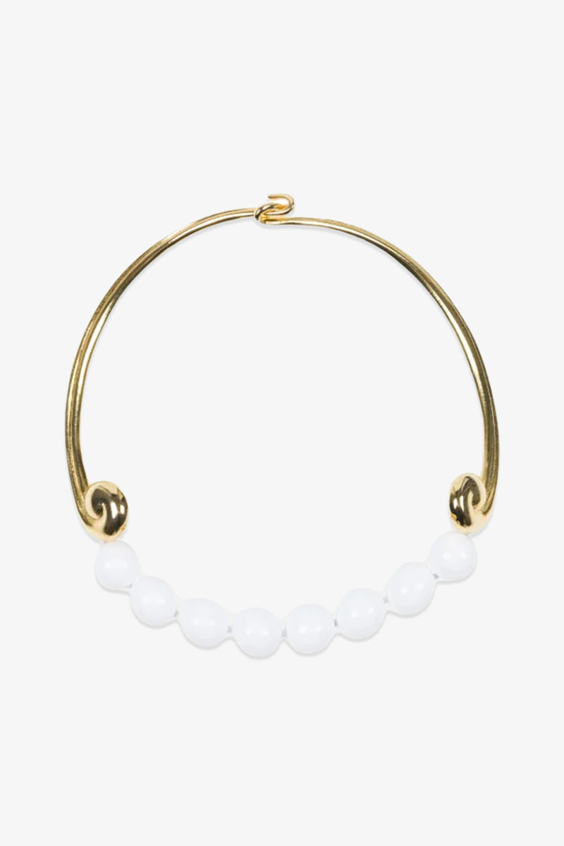 KJL Beaded White and Gold Collar Necklace featuring a row of round white beads along the bottom curve, with an open-ended design and a simple hook clasp at the top.