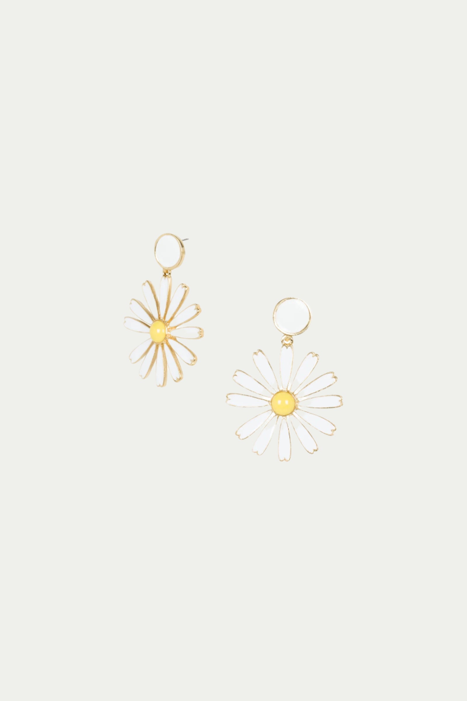 TT x KJL Daisy Enamel Drop Earrings in white, featuring daisy-shaped gold hoops with yellow centers and white petals, displayed against a plain white background.