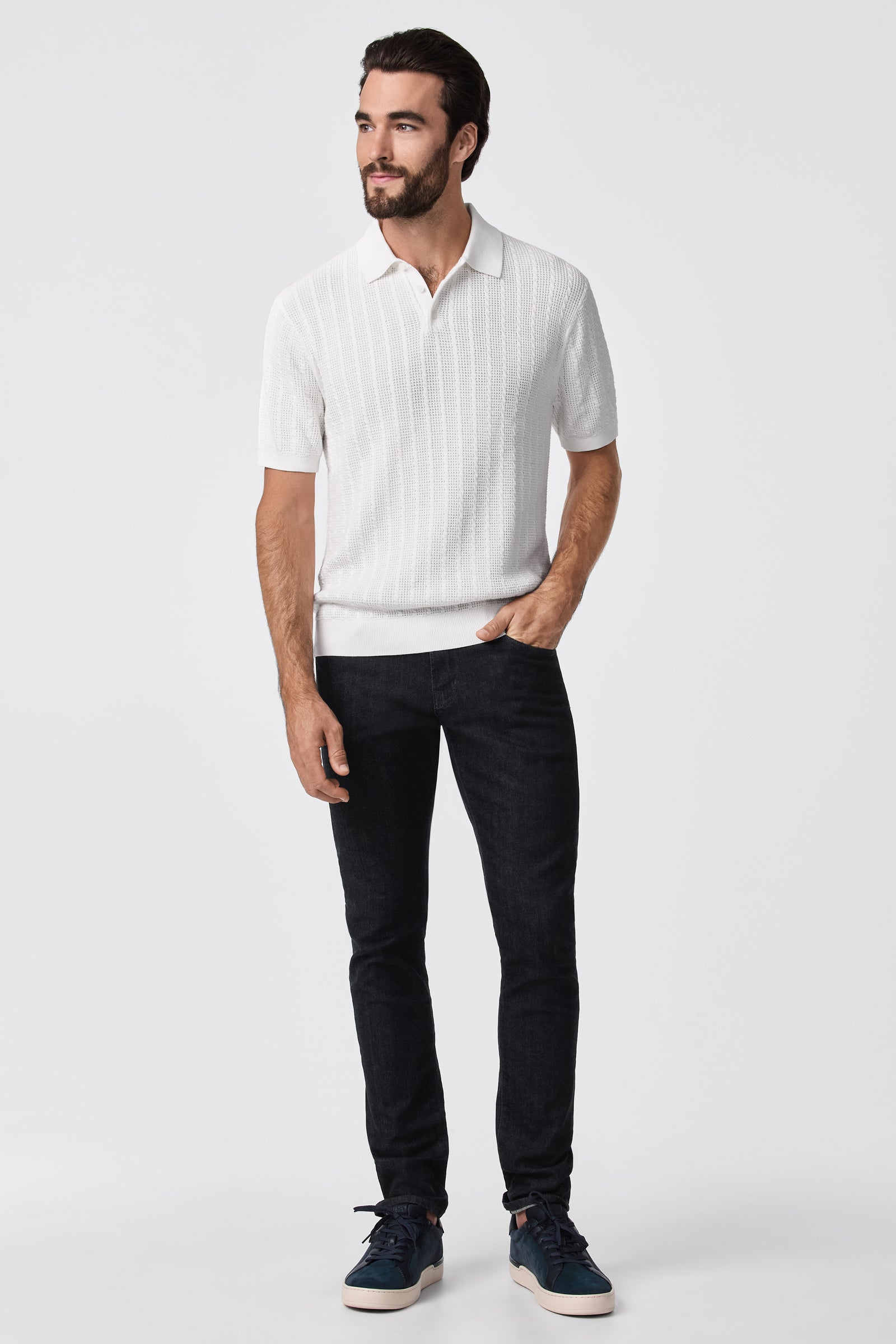 A man wearing the Asher Short-Sleeve Polo.