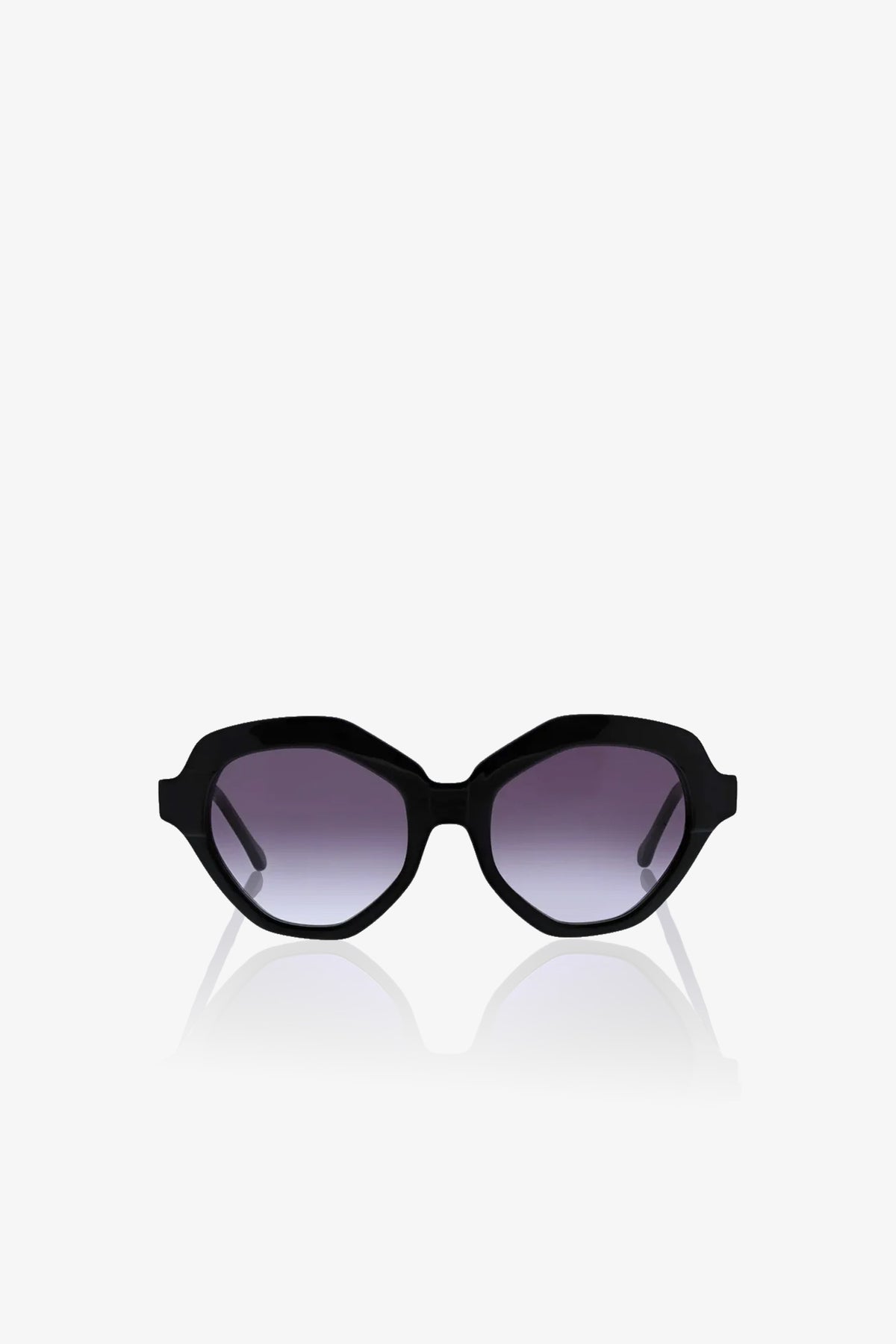 The Ipanema Sunglasses feature a black oval-shaped design with thick frames and dark tinted lenses, showcased facing forward on a plain white background.