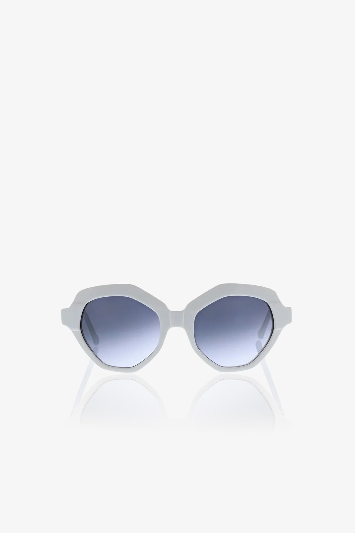 The Ipanema Sunglasses feature white geometric, angular frames and blue gradient lenses, showcased against a plain white background.