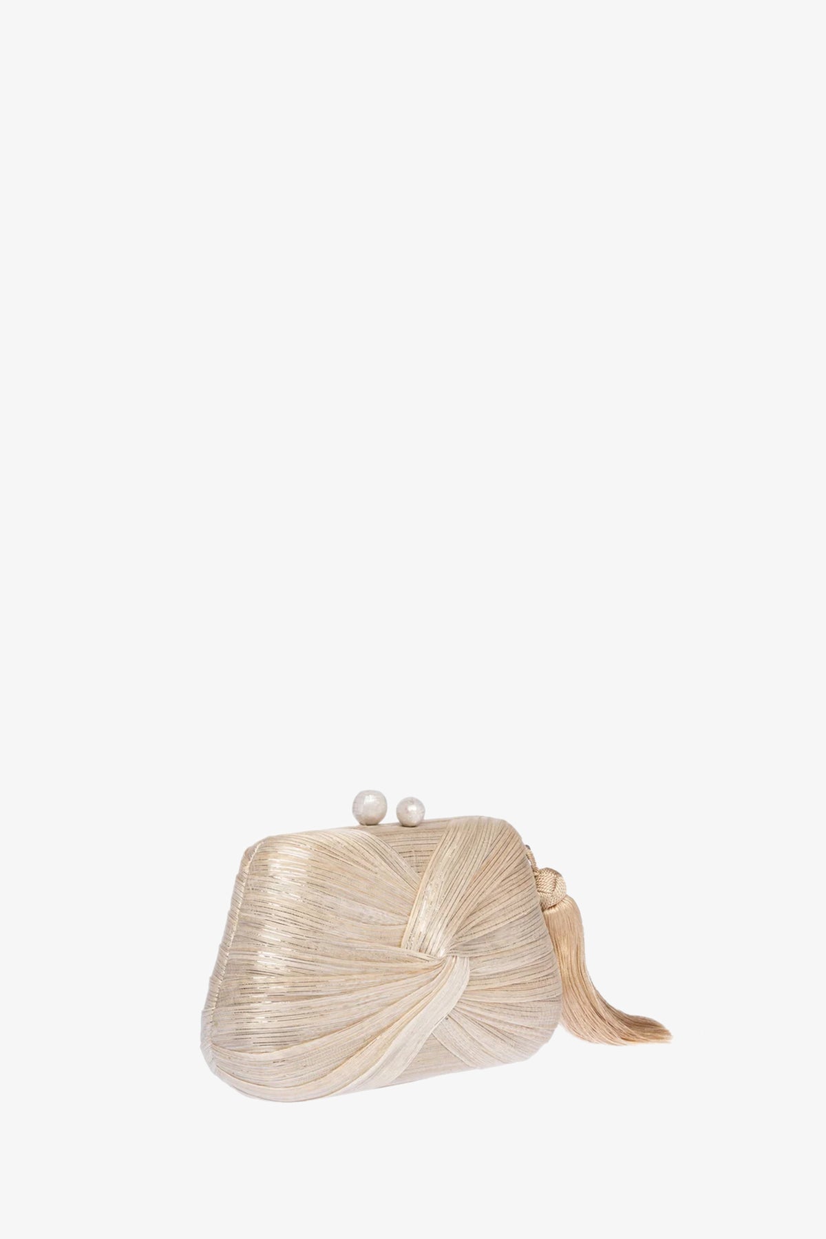 The Rosie Draped Clutch is a small beige bag with a textured, wrapped design, a decorative knot on one side, and a clasp closure topped with two pearl-like spheres.