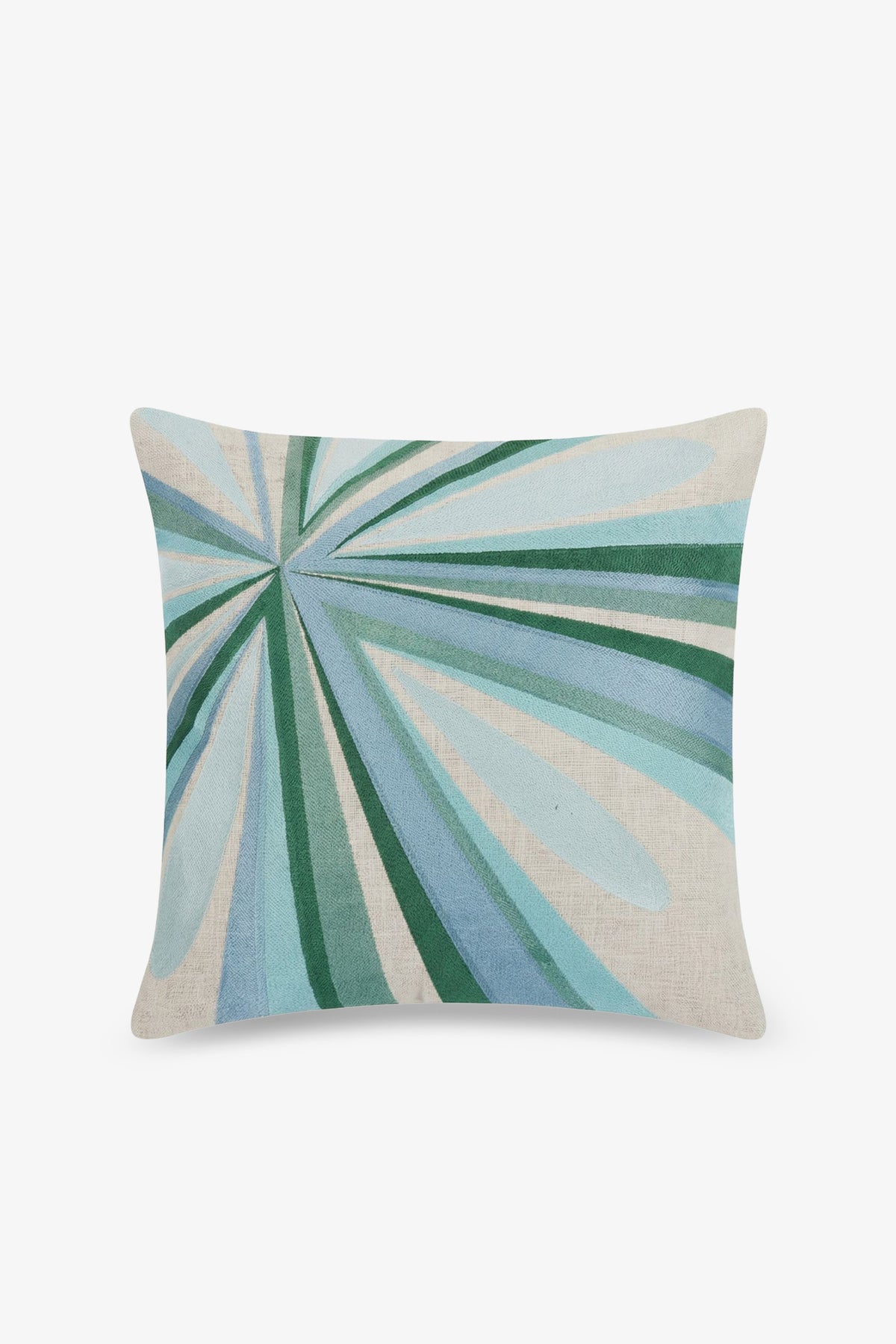 The Shante Embroidered Square Pillow features an abstract, radiating pattern in shades of blue and green on a light beige background.