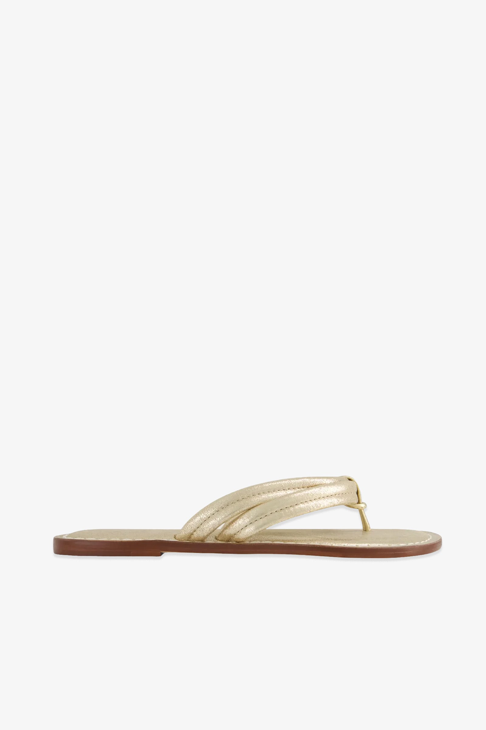 The Miami Sandal is a single gold metallic thong sandal with a flat brown sole, displayed in a side profile on a plain white background.
