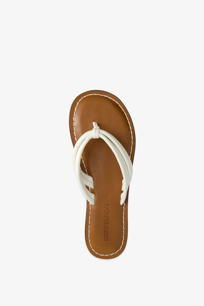 A top view of the Miami Sandal in brown, featuring white double straps with a central knot, displayed on a plain white background.