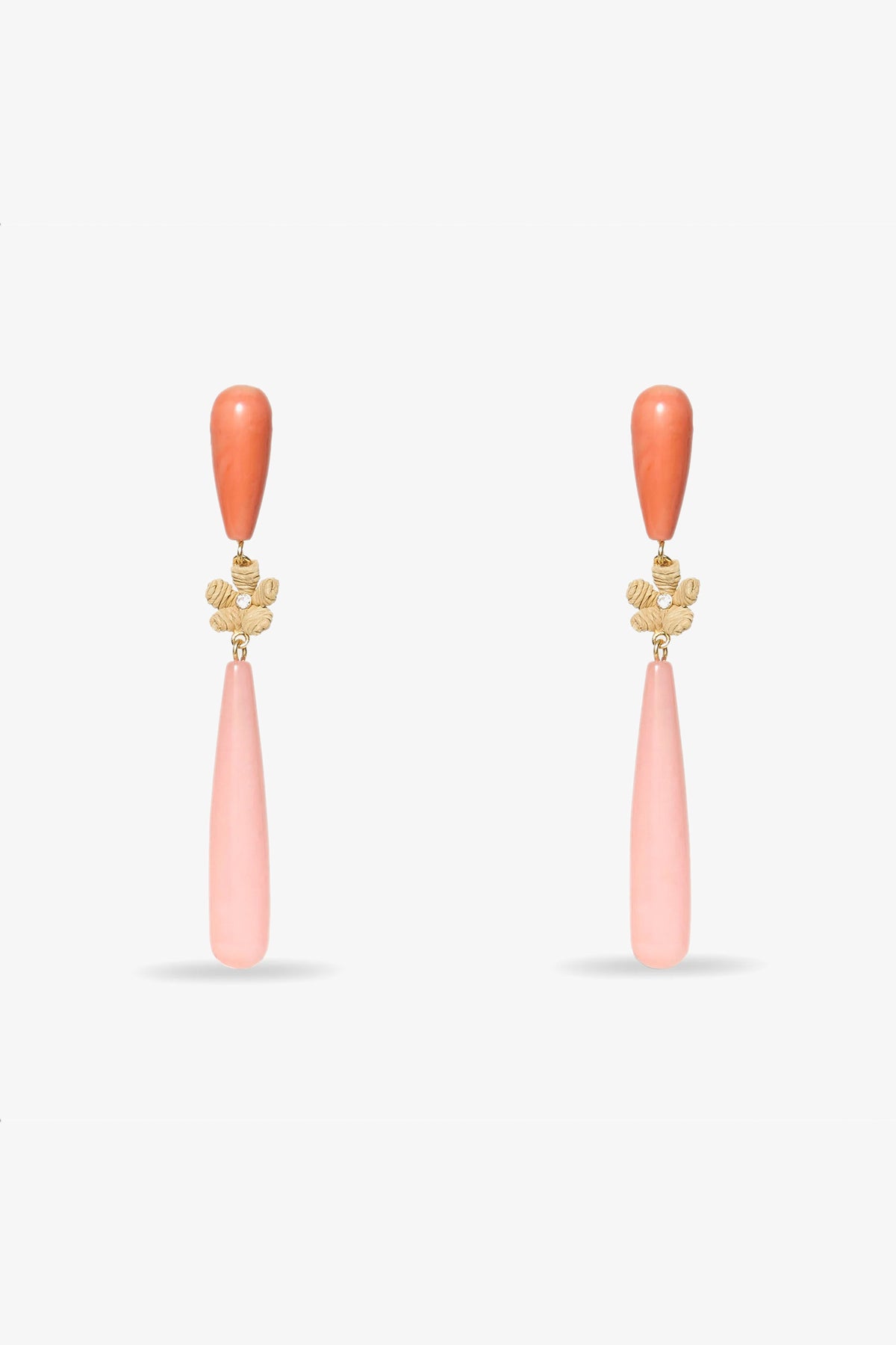 The Flamingo Linear Earring features coral-hued teardrop studs, gold floral accents, and long pale pink teardrop pendants for an elegant drop earring style.