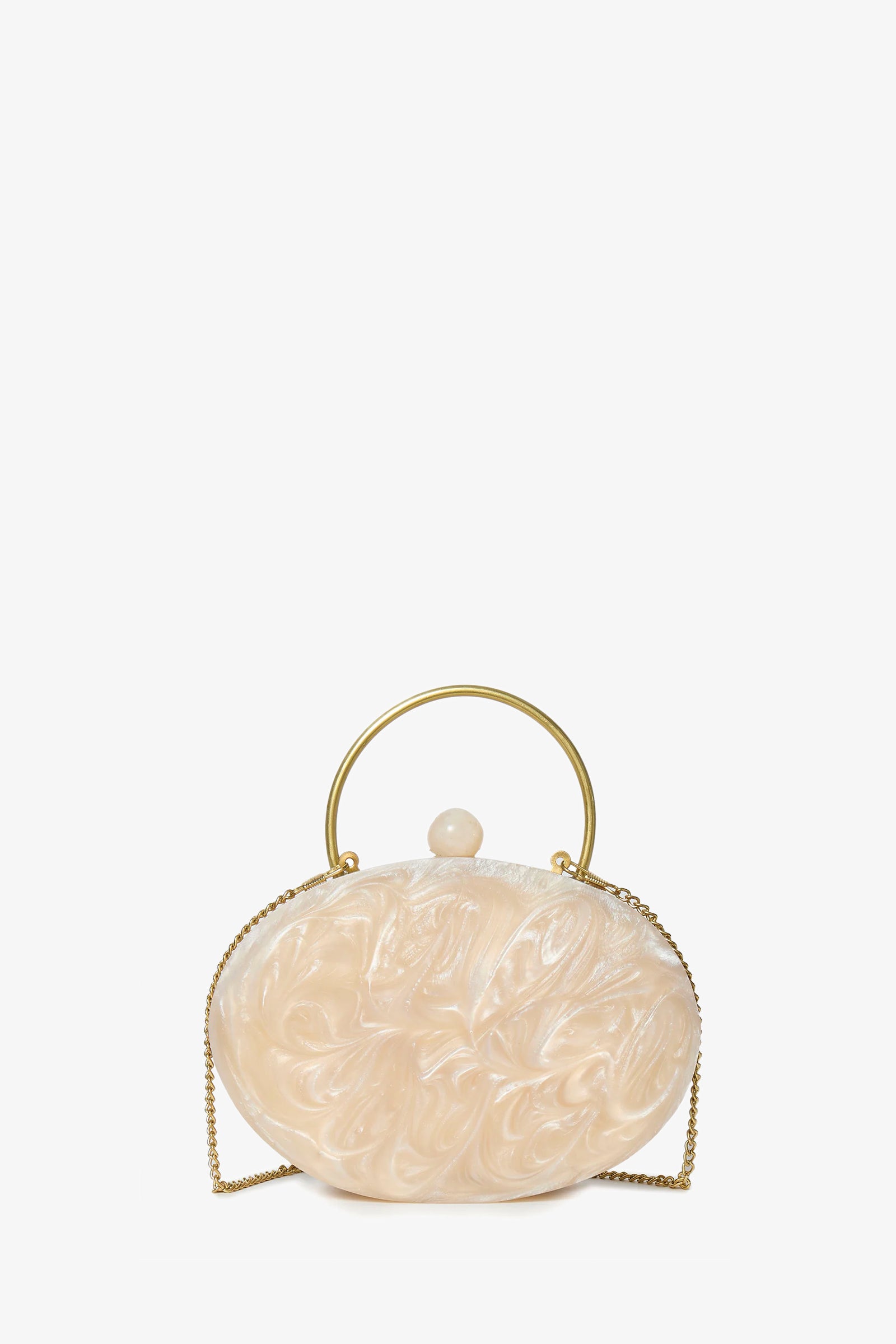 The Ivory Pearl Oval Minaudiere is an ivory, oval-shaped clutch with a marbled finish, gold metal handle, matching clasp, and gold chain strap, shown against a plain white background.