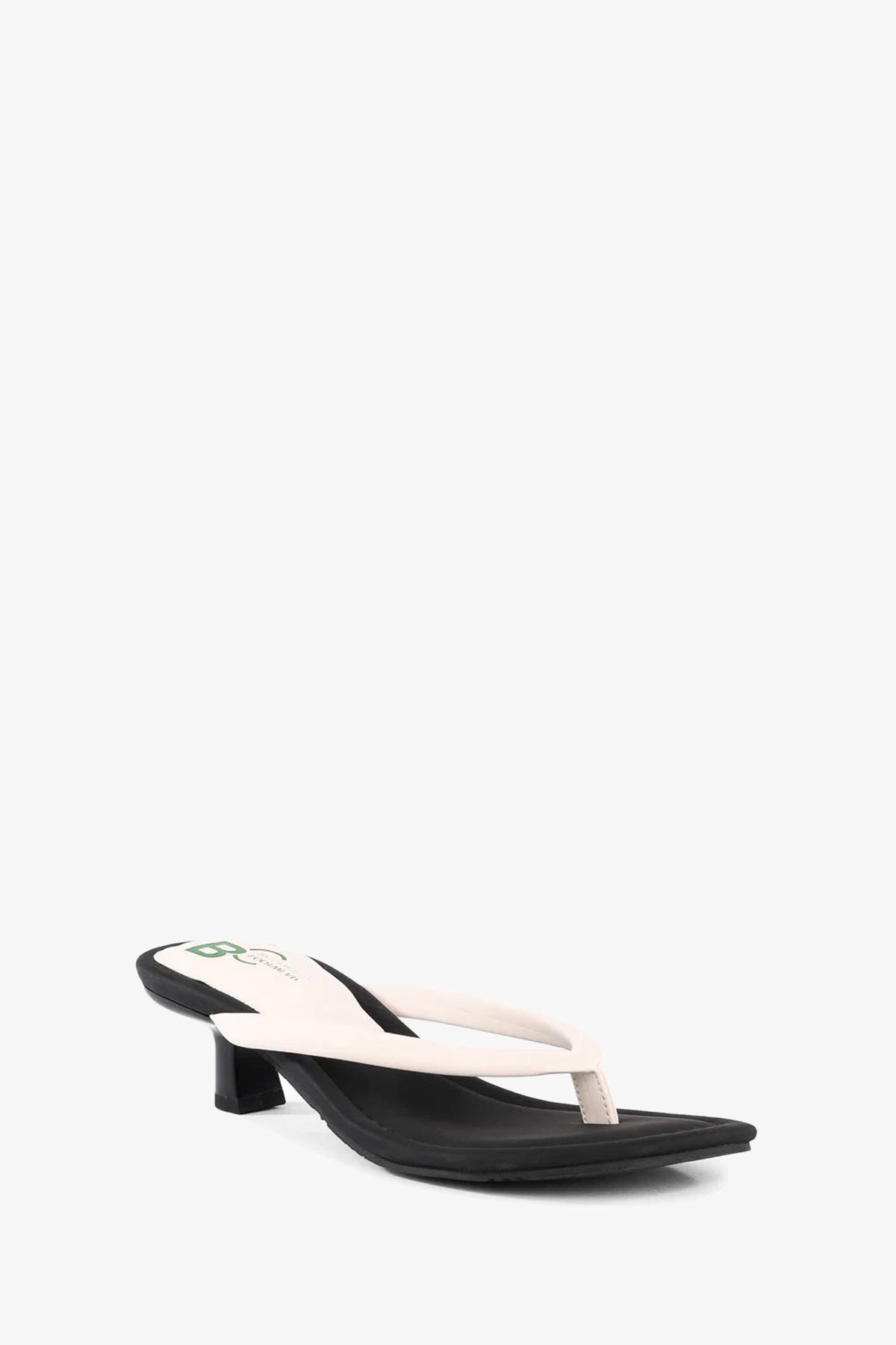 A single Riptide Sandal with a low black heel and white thong strap, displayed on a plain white background.