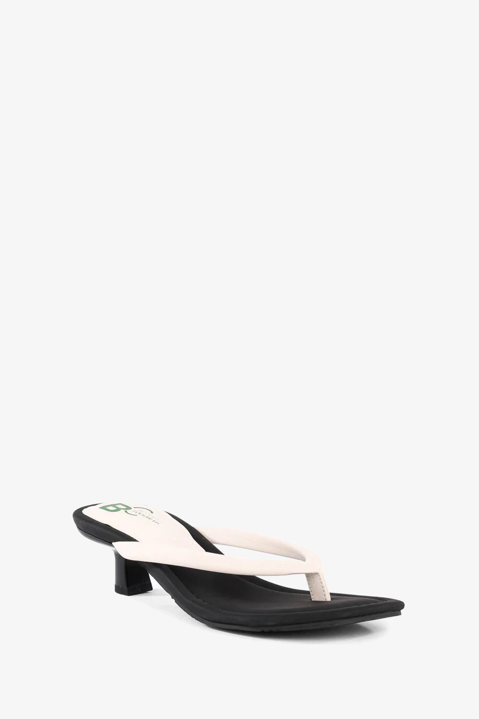A single Riptide Sandal with a low black heel and white thong strap, displayed on a plain white background.