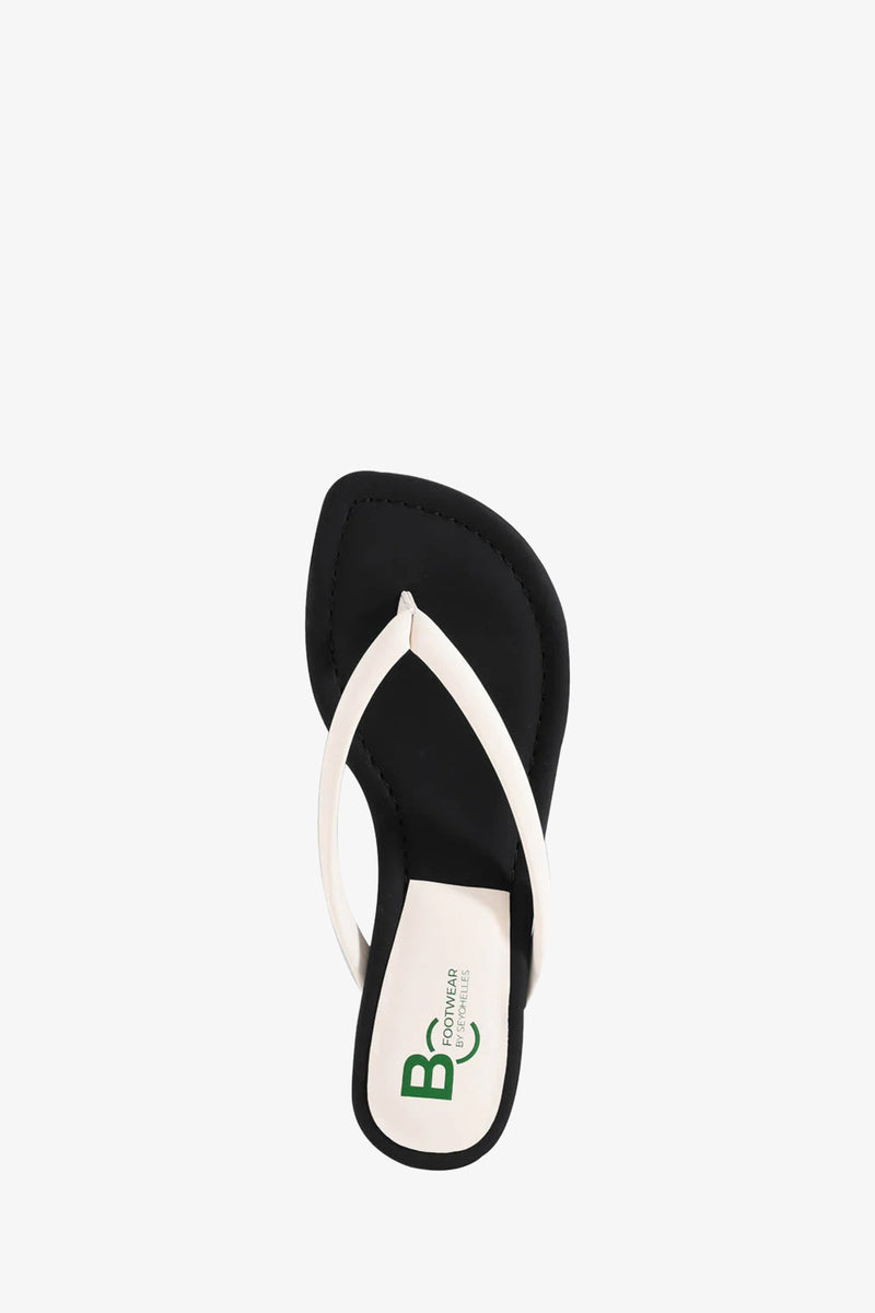 The Riptide Sandal features a white flip-flop design with green BOG and FOOTWEAR BY SEYCHELLES logos on the sole.