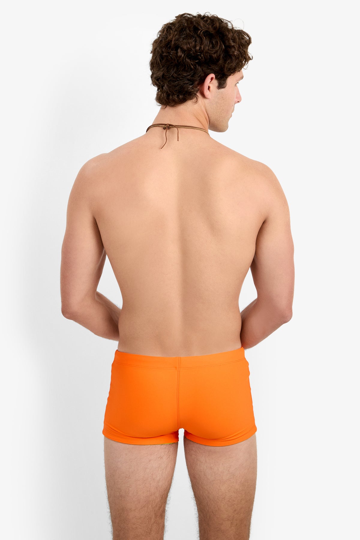 Of course! Please provide the keywords you'd like me to blend into the SEASIDE BCH SWIM TRUNK description.