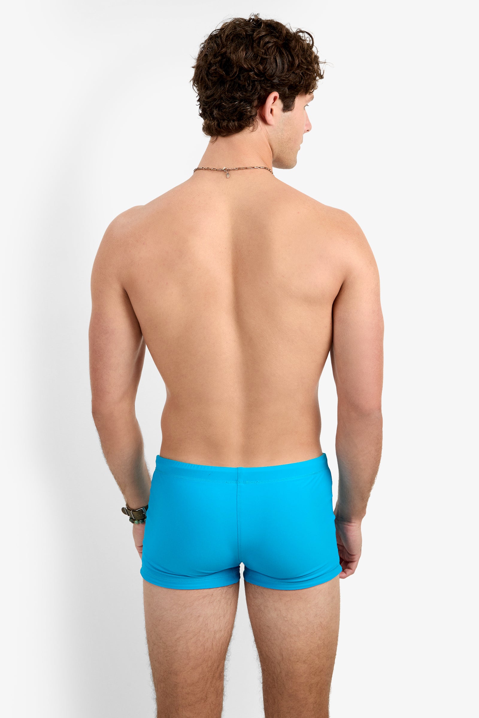 Of course! Please provide the keywords you'd like me to use for the SEASIDE BCH SWIM TRUNK.