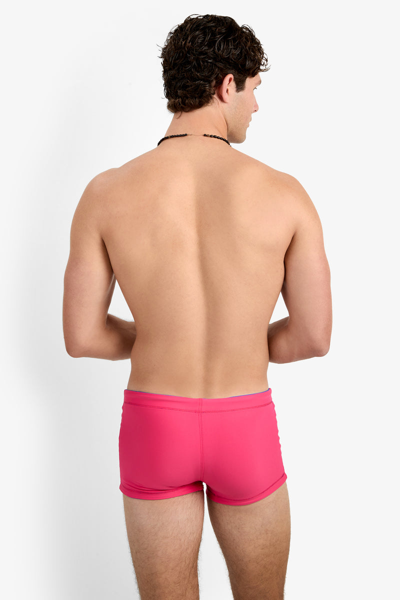 Of course! Please provide the keywords you'd like me to use, and I'll blend one or two into the SEASIDE BCH SWIM TRUNK description as requested.