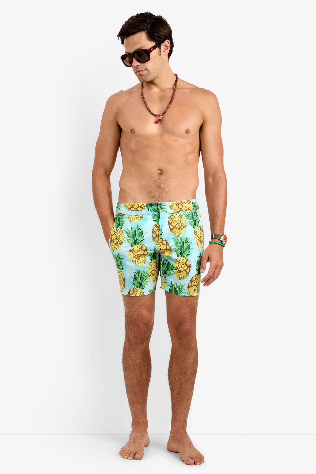 Of course! Please provide the keywords you'd like me to blend into the description for the HONOLULU BOARD SHORT in Pineapples.
