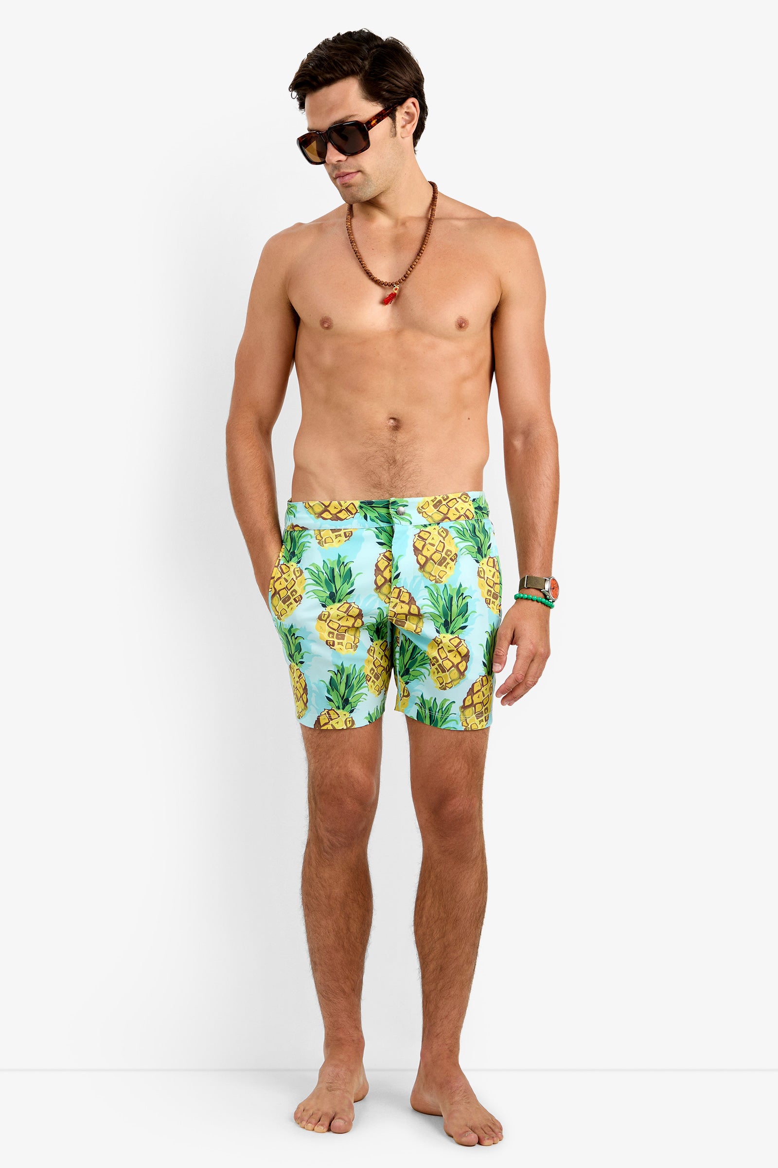 Of course! Please provide the keywords you'd like me to blend into the description for the HONOLULU BOARD SHORT in Pineapples.