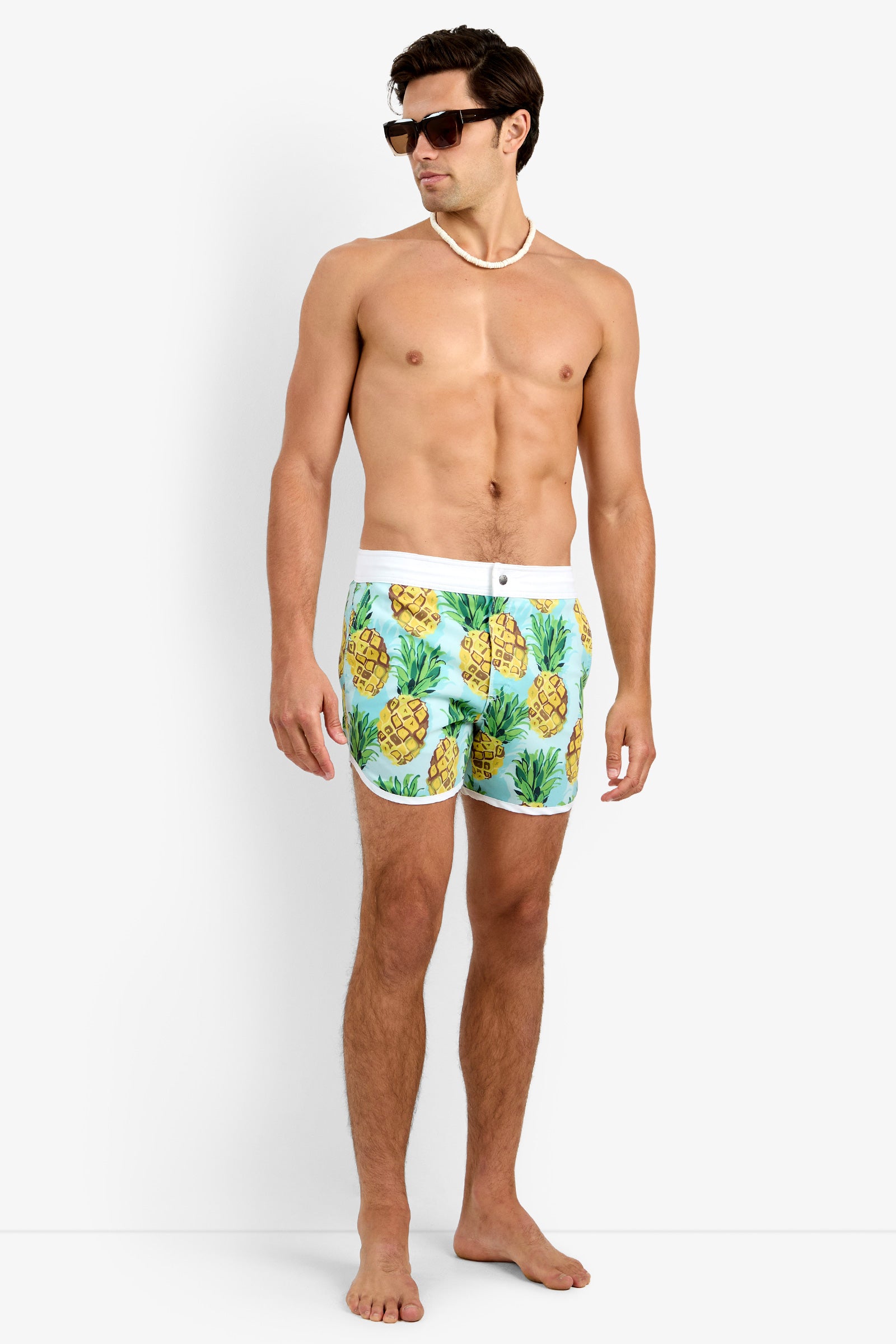 Of course! Please provide the keywords you'd like me to use for the SURFSIDE BOARD SHORT in Pineapples.
