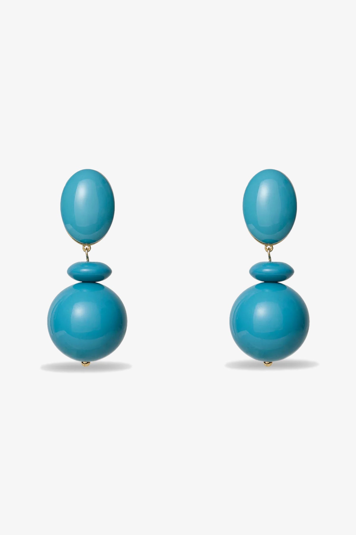 The Aventura Drop Earrings feature turquoise oval and spherical beads, shown on a white background.