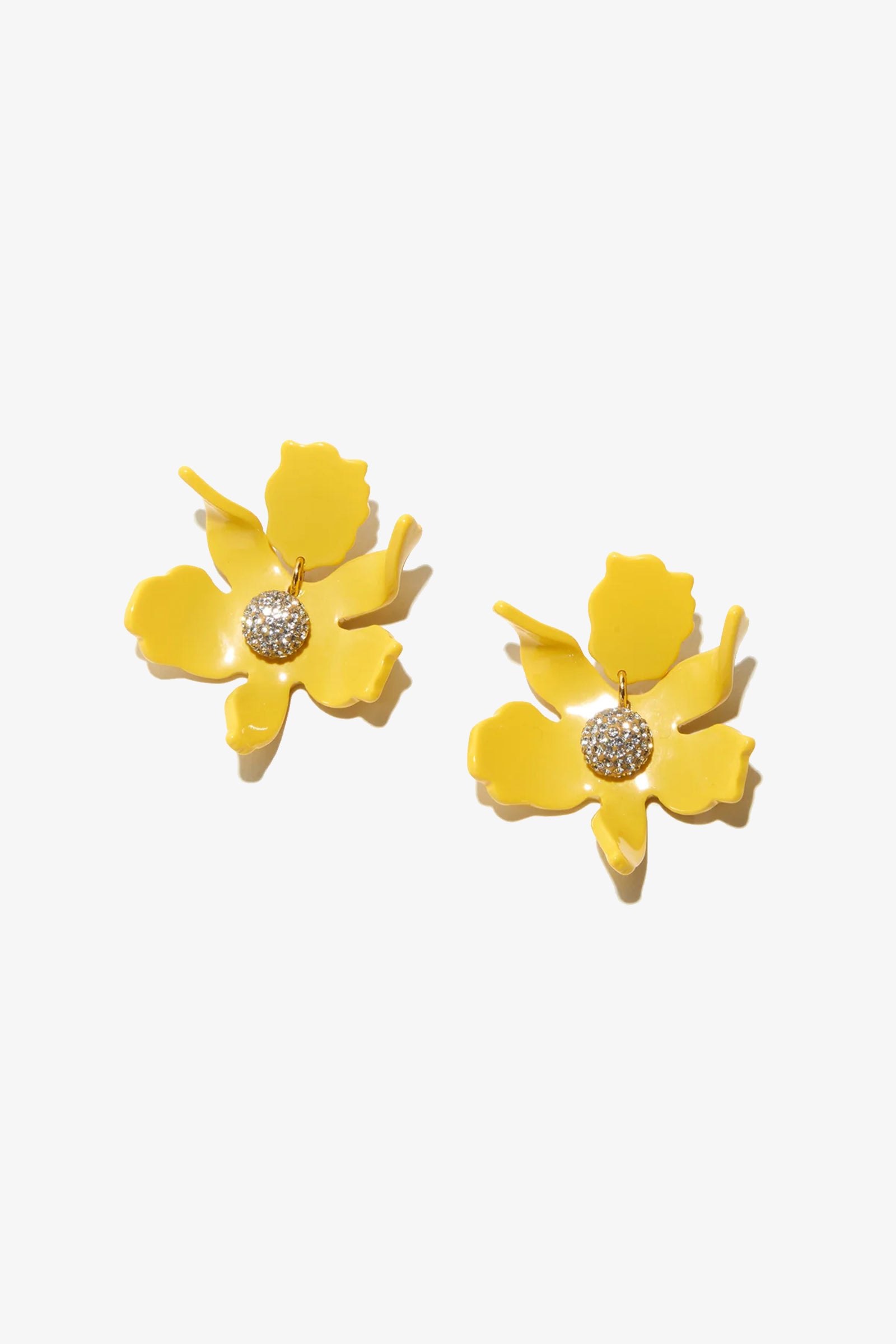 The Sunflower Small Crystal Lily Earrings feature yellow flower shapes with glossy petals and a sparkling rhinestone center, shown on a white background.