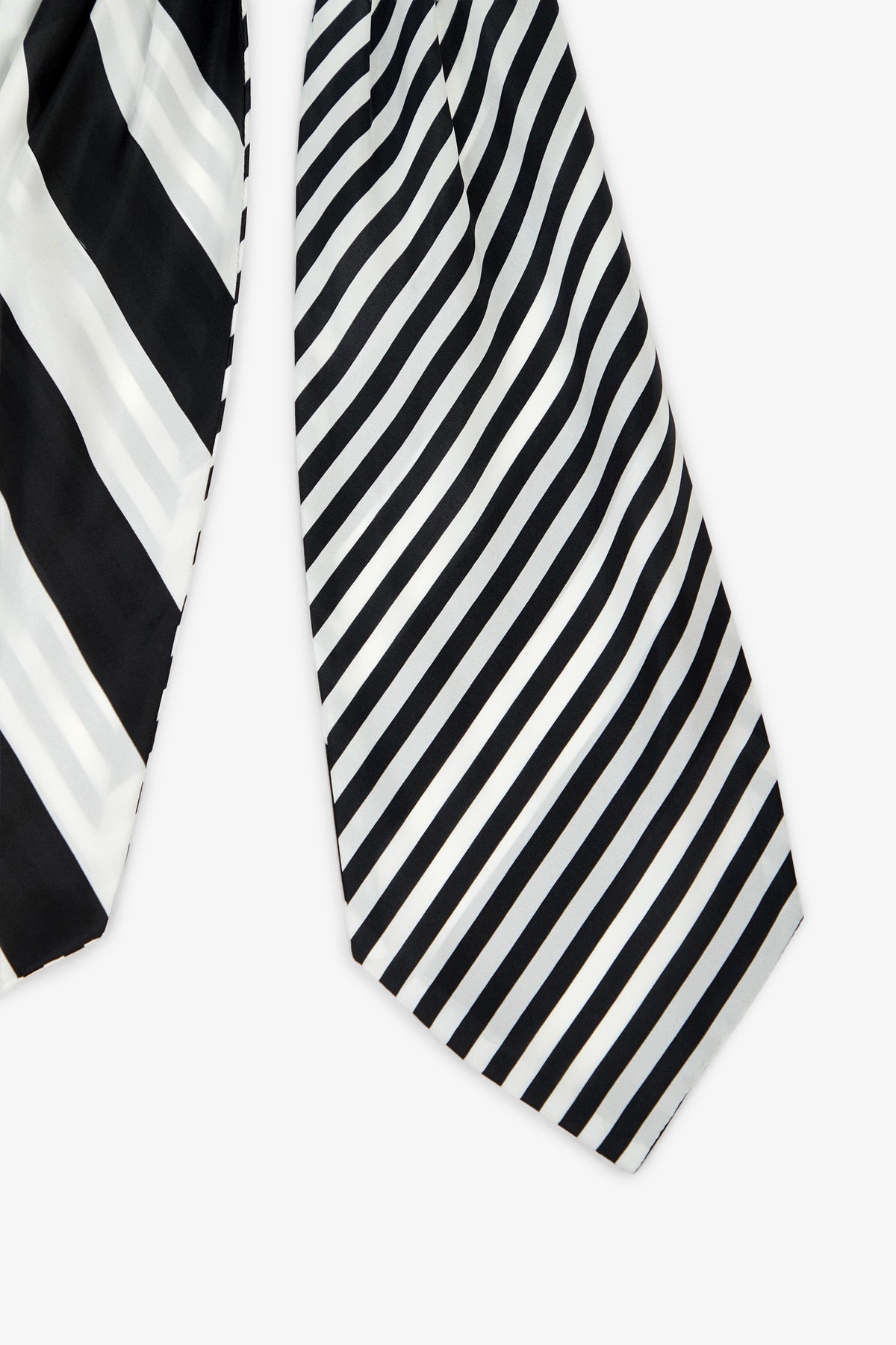 Two Savoir Stripe Silk Ascots with diagonal stripes: the left ascot features wide black and white stripes, while the right ascot displays narrower black, gray, and white stripes. Both ascots are set against a plain white background.