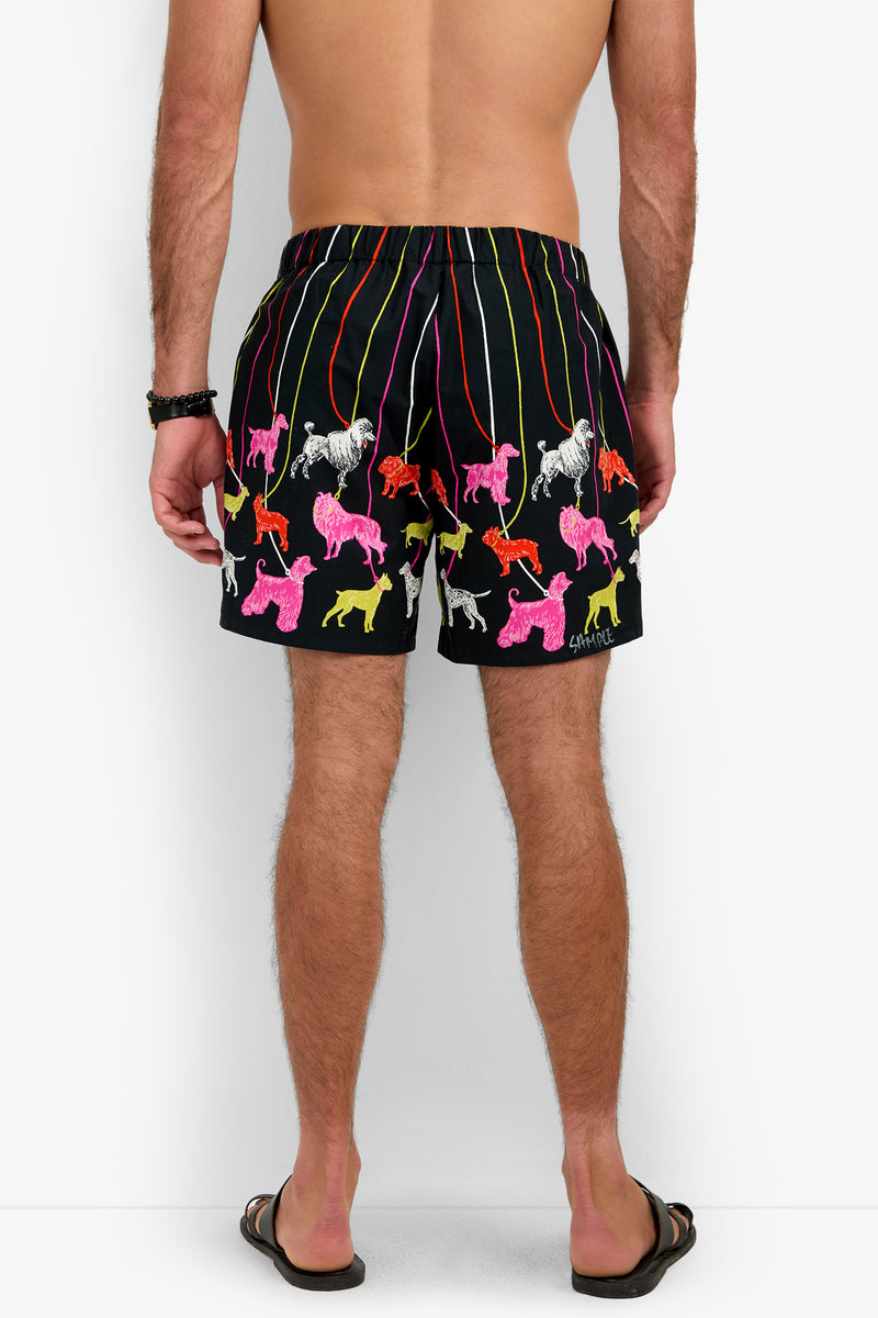 PJ SHORT black shorts with a pattern of colorful, sketch-style dog silhouettes on leashes.
