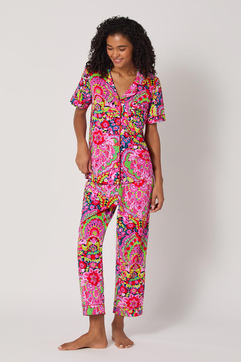 Of course! Please provide the keywords you'd like me to use, and I'll include one or two in the description for the LAS FLORES S/S CROPPED PJ SET as requested.