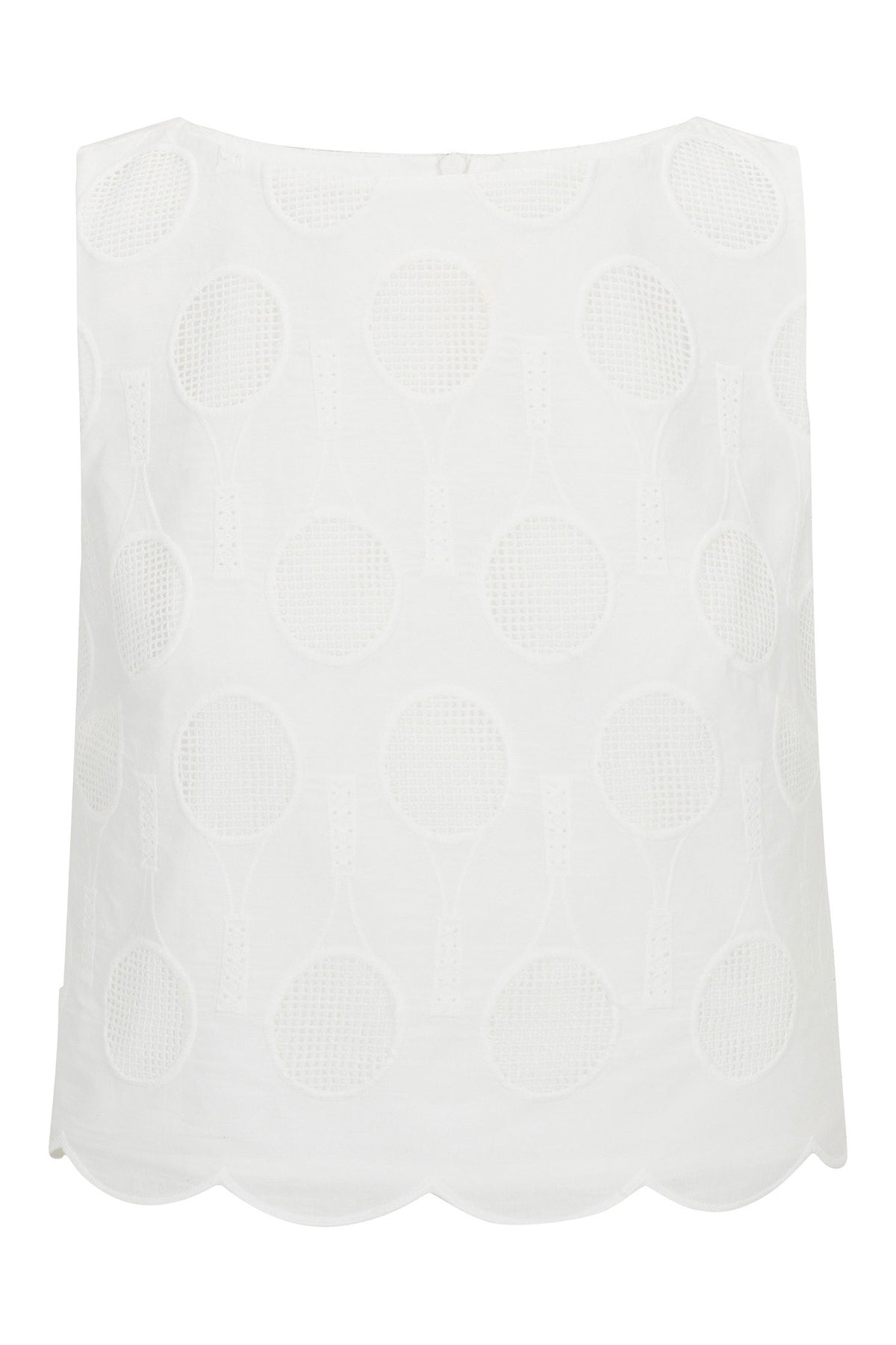 The Split Sleeveless Crop Top - Tennis Eyelet is a white, sleeveless top with embroidered tennis rackets and balls, plus a scalloped hem.