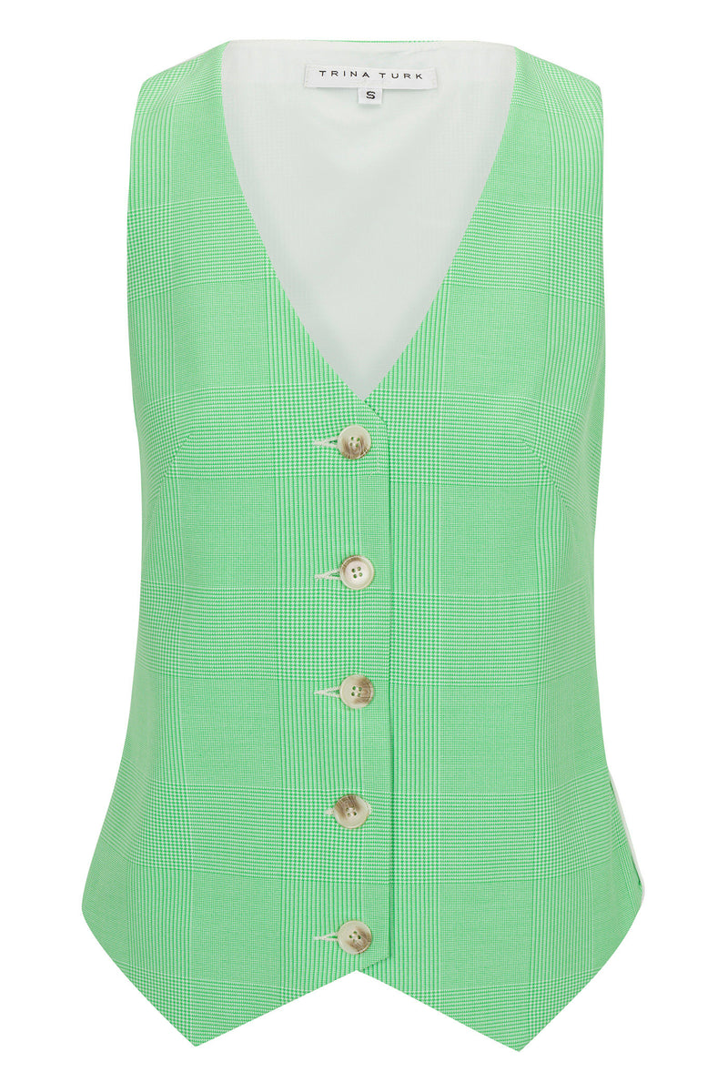 The Challenge Vest Top - Game Time Glen Plaid is a sleeveless, light green plaid vest with a deep V-neck, five beige front buttons, and an inner collar label marked Trina Turk.