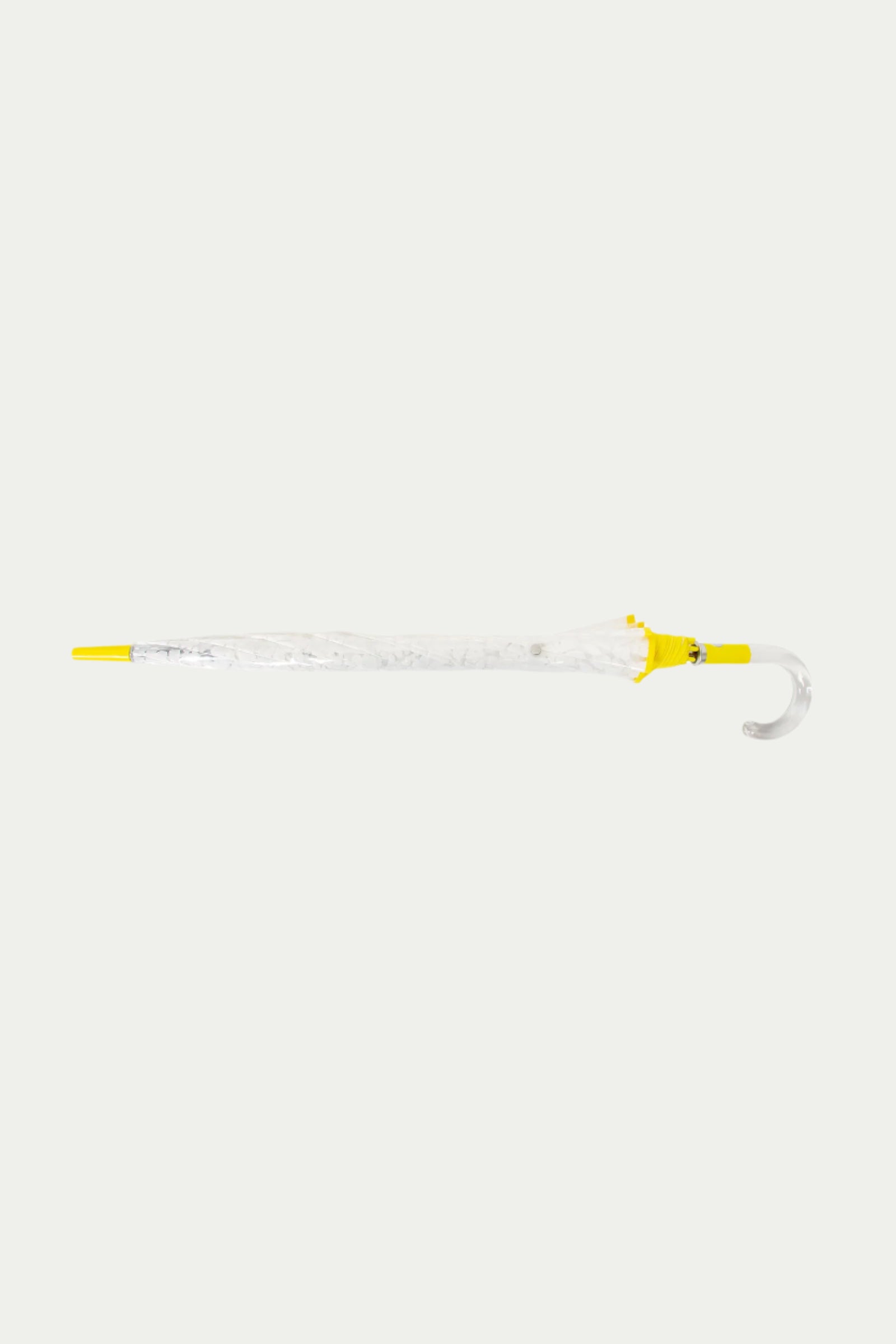 The TT X SR Clear Bubble Umbrella - Poolside, featuring yellow accents and a clear curved handle, is shown closed and displayed horizontally on a plain white background.