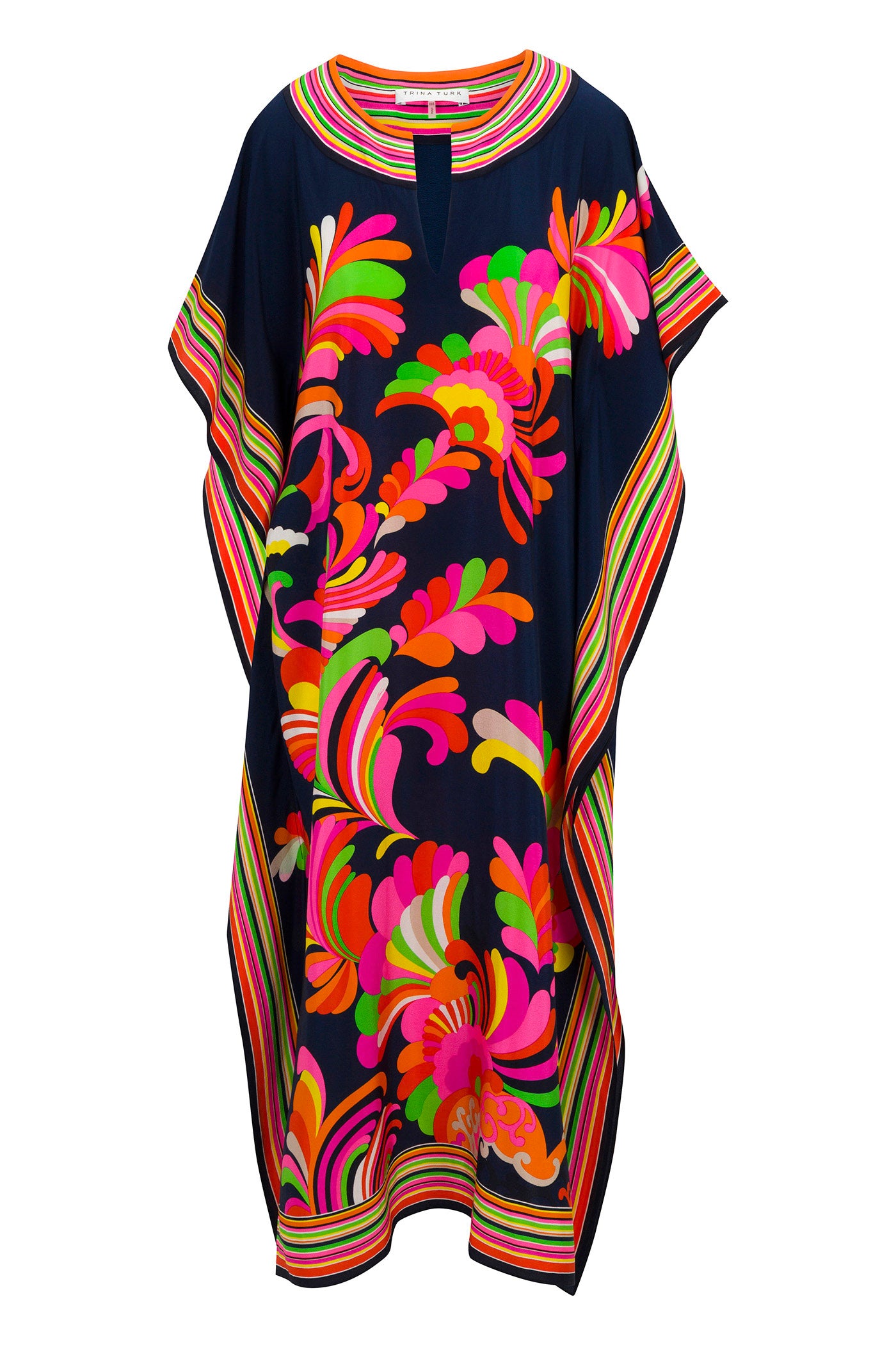 The Theodora Maxi Caftan - Paradise Palms Silk is a flowing navy dress with vibrant multicolored abstract floral patterns, bold striped borders in pink, orange, yellow, and green, plus a round neckline with a small front slit.