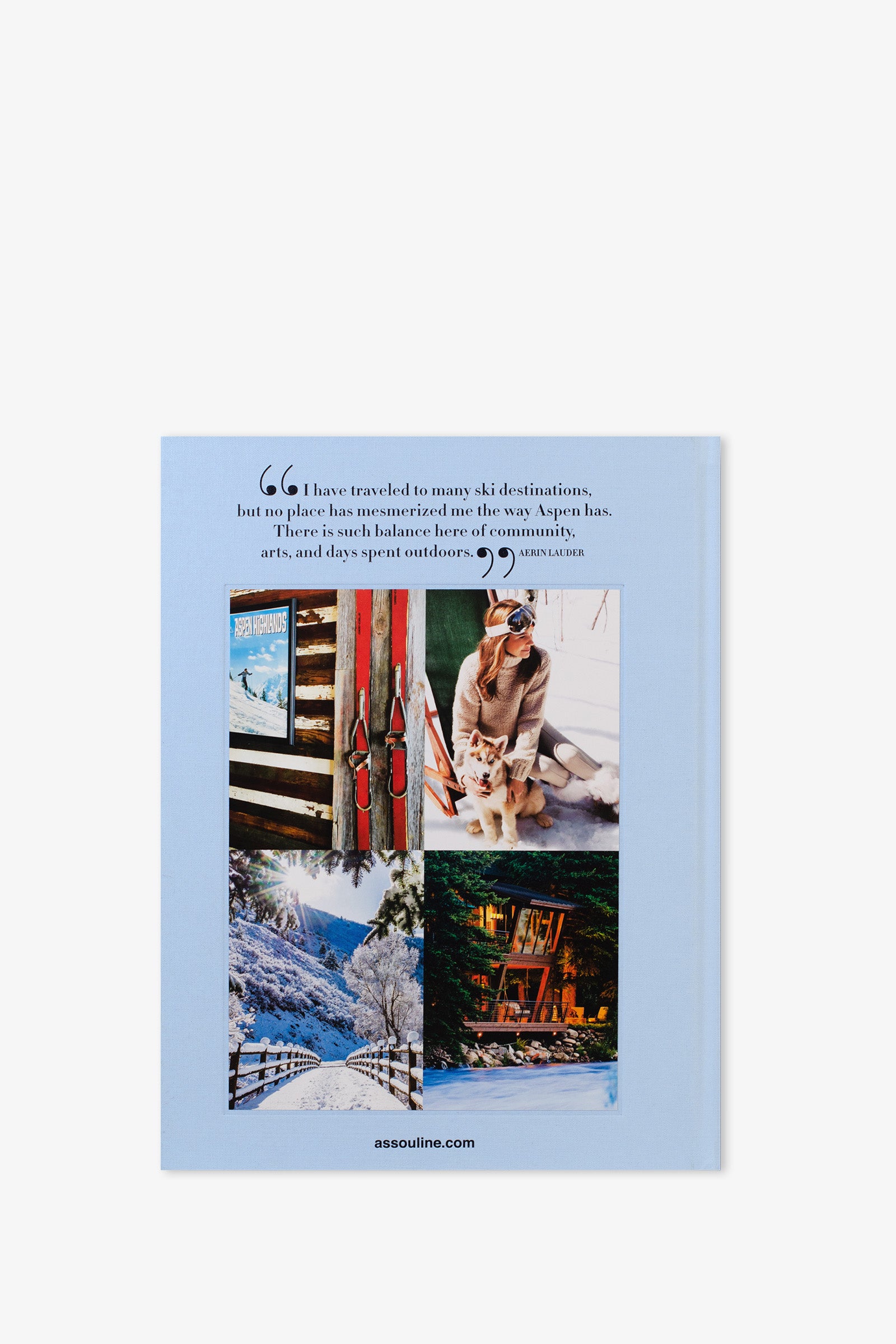The back cover of the Assouline Aspen Style Book features a quote about Aspen and four photos: old skis, a dog with a person, a snow-covered path, and a cozy cabin, all set against a light blue background.