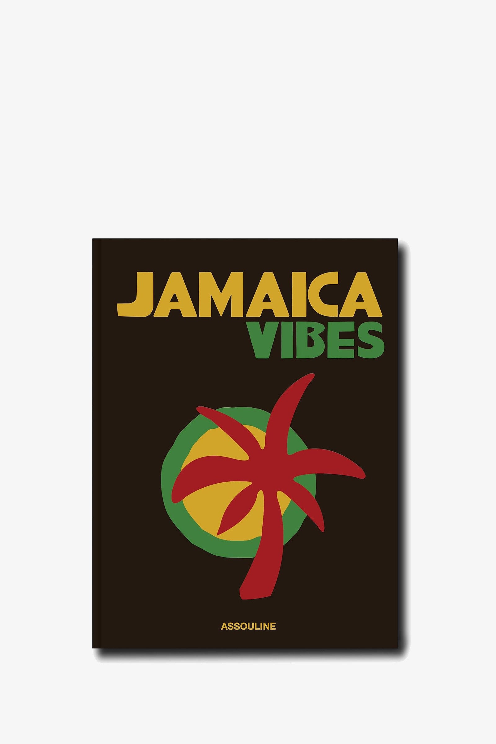 Assouline Jamaica Vibes book cover features the title in yellow and green text above a red, green, and yellow tropical graphic on a black background, with the publisher name ASSOULINE at the bottom.