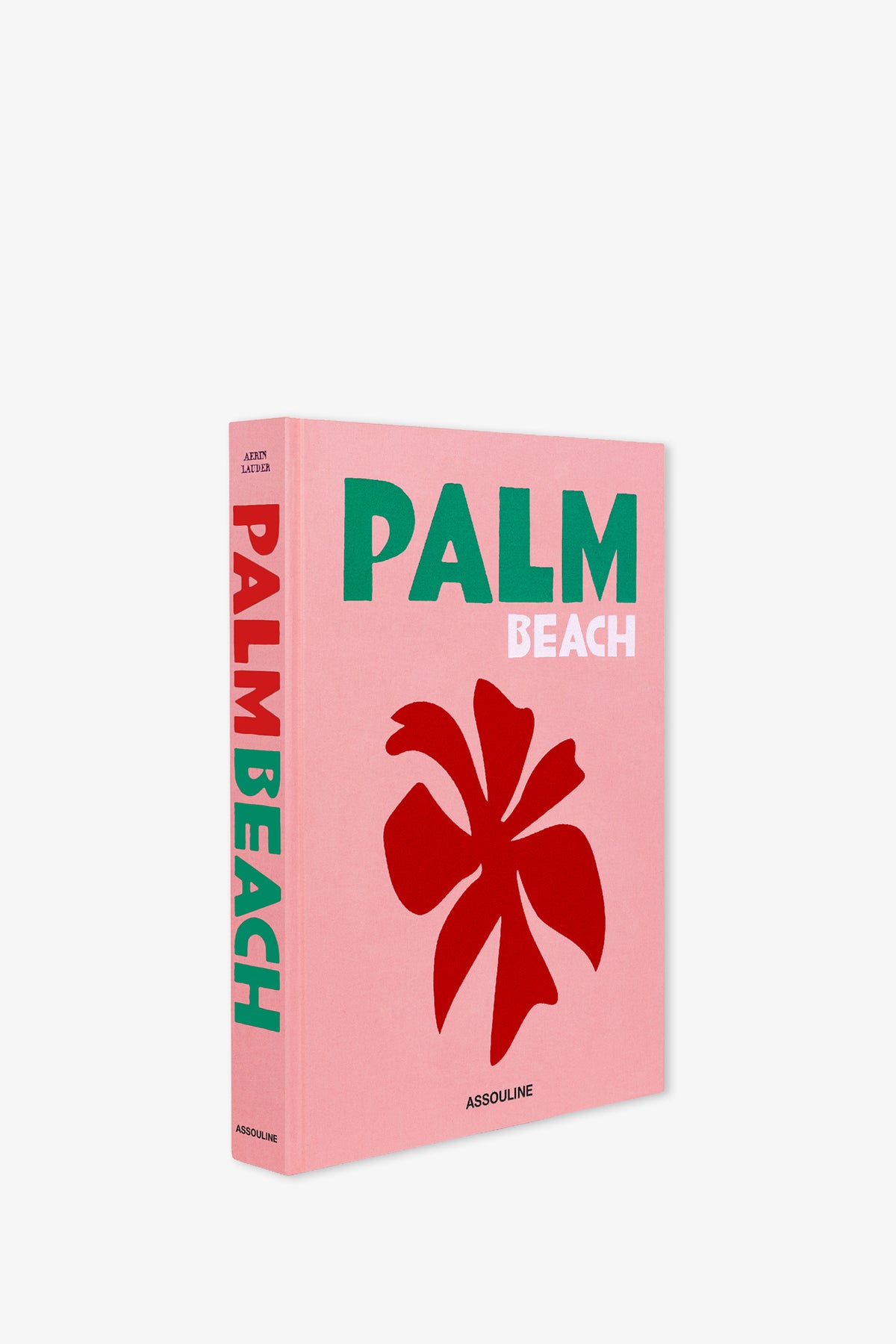 The Assouline Palm Beach Book features a pink cover with green and white text, a prominent red palm flower graphic, and the publisher’s name, Assouline, at the bottom.