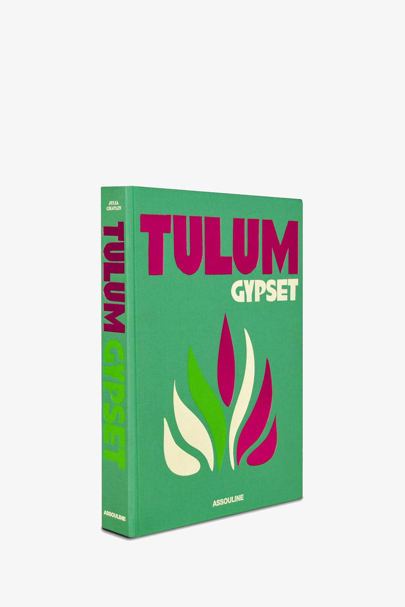 Assouline Tulum Gypset book with a green hardcover featuring the title in magenta and a stylized leaf graphic.